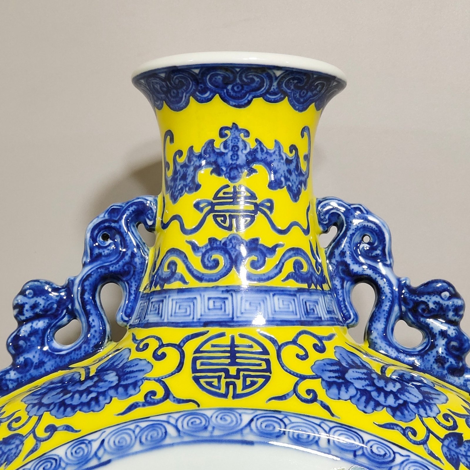 Qing Dynasty Qianlong blue and white with yellow glaze window landscape flat vase
