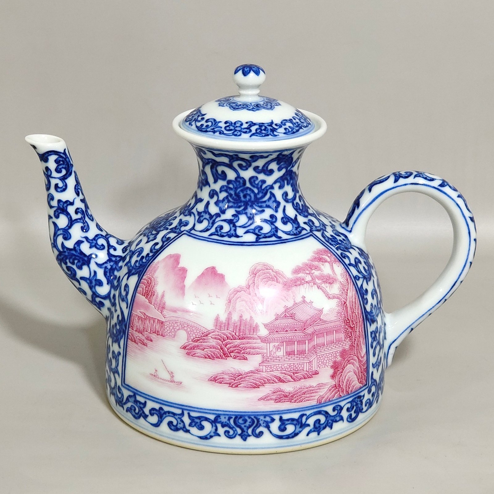 Qing Dynasty Qianlong blue and white longevity teapot with window agate and red landscape
