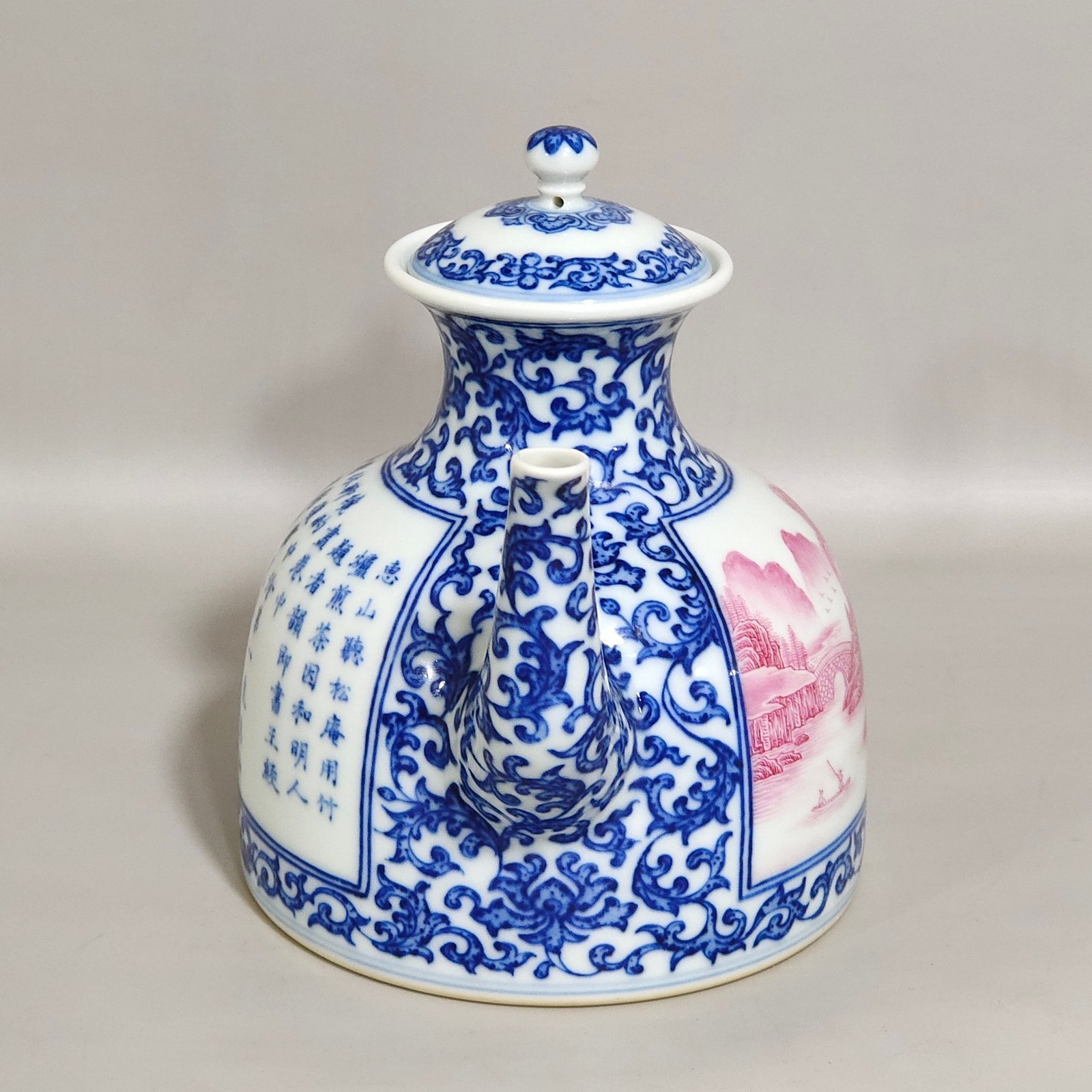 Qing Dynasty Qianlong blue and white longevity teapot with window agate and red landscape
