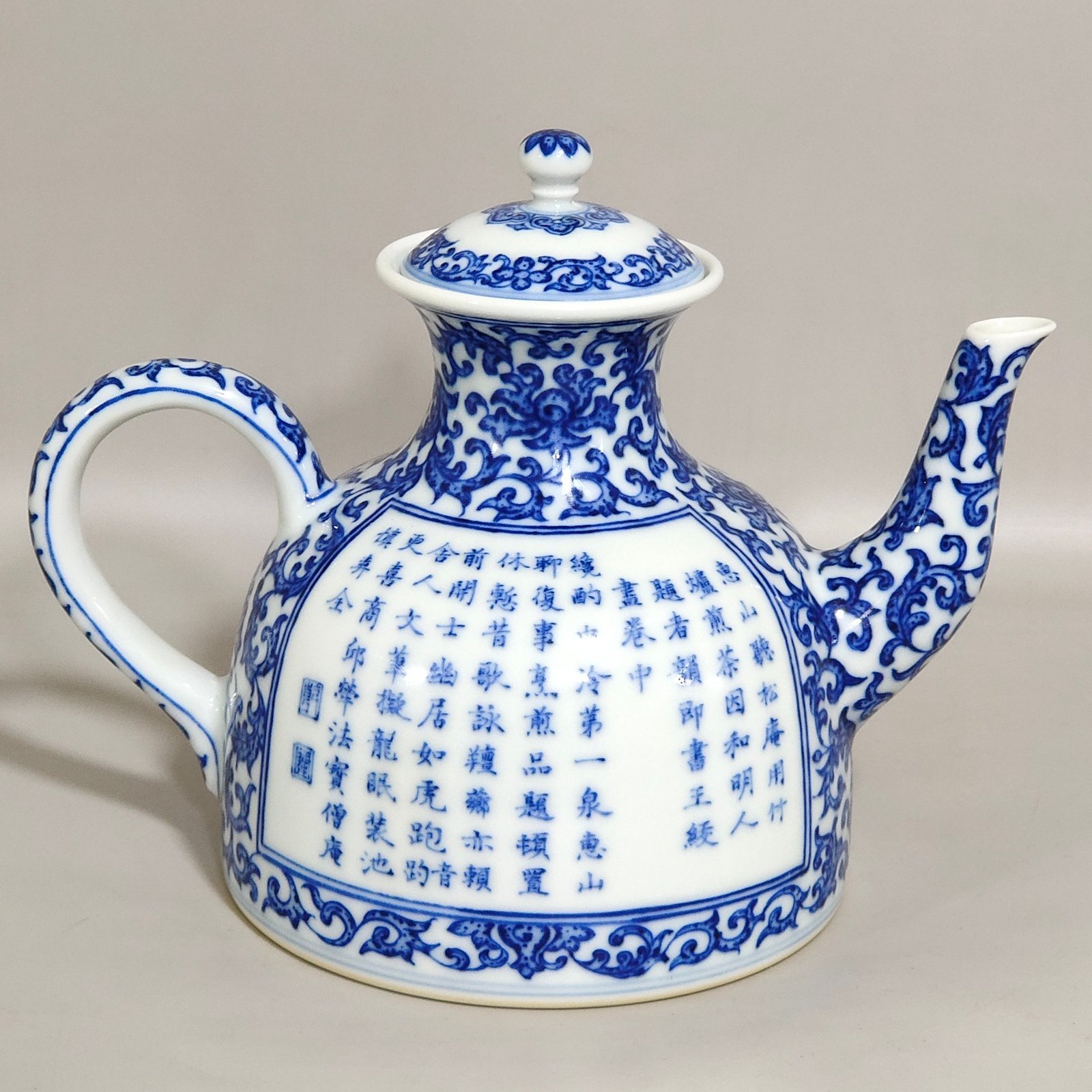 Qing Dynasty Qianlong blue and white longevity teapot with window agate and red landscape