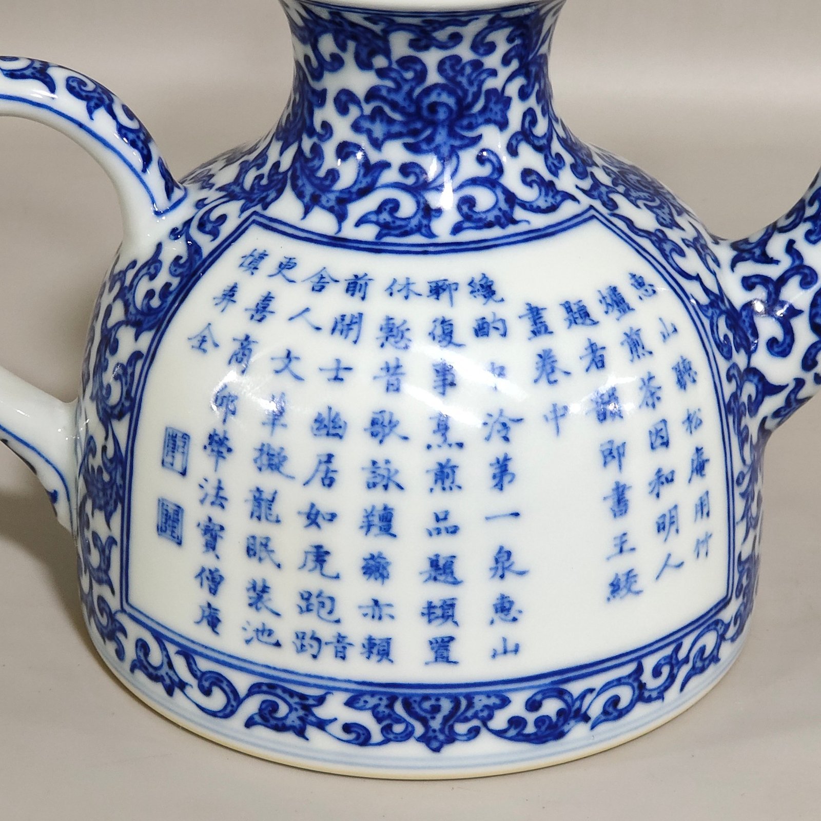 Qing Dynasty Qianlong blue and white longevity teapot with window agate and red landscape
