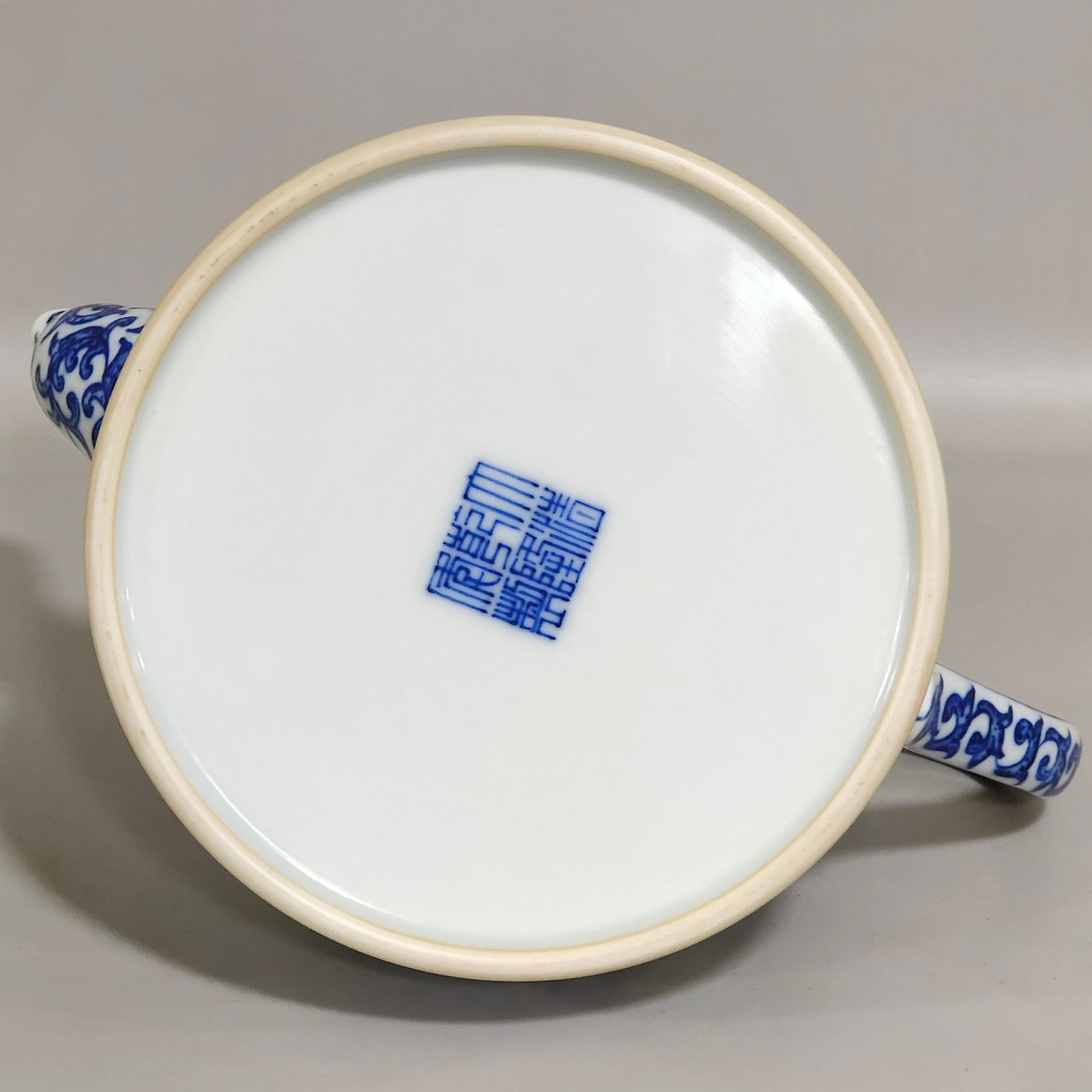 Qing Dynasty Qianlong blue and white longevity teapot with window agate and red landscape