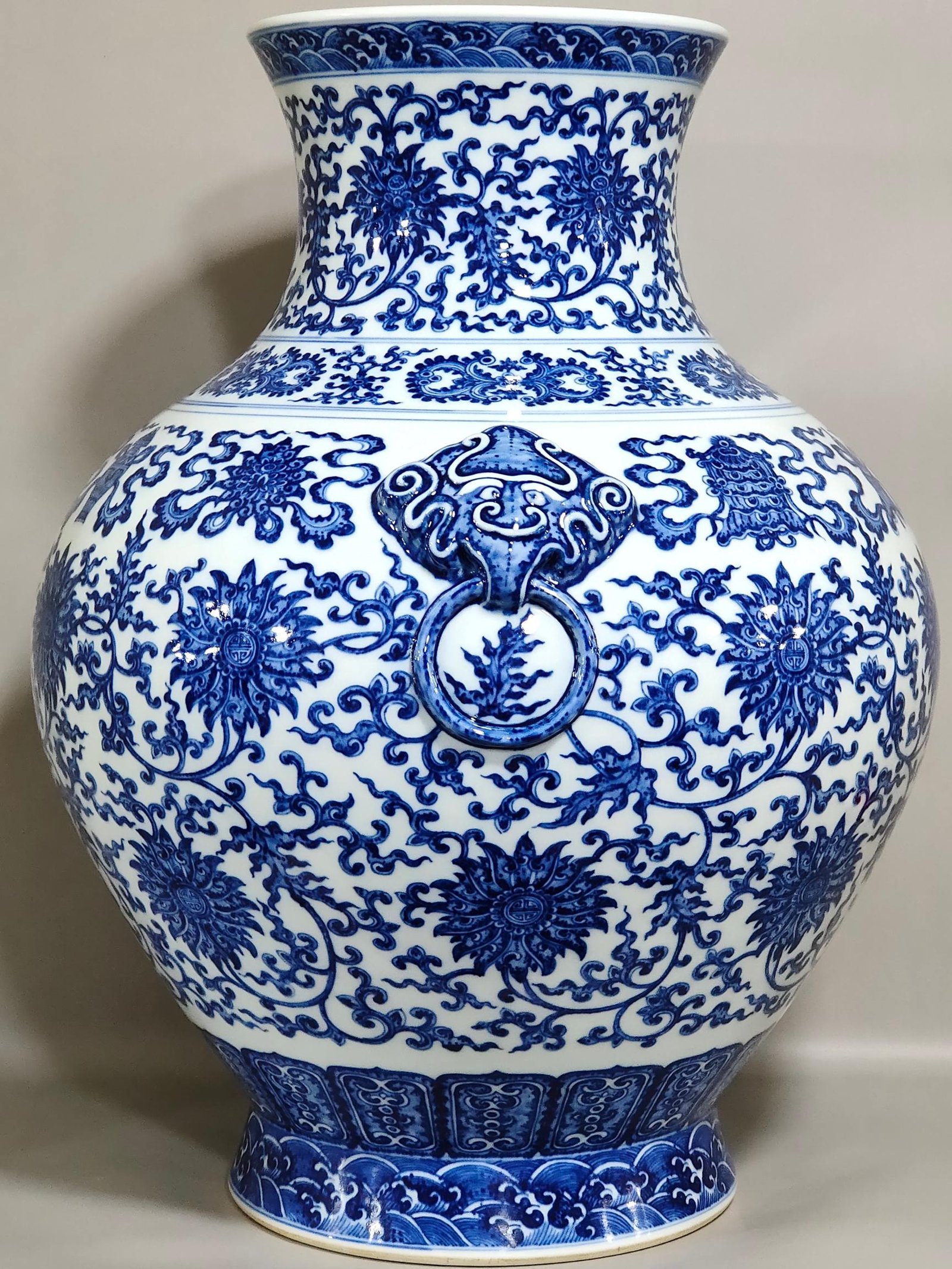 Qing Dynasty Qianlong blue and white intertwined branches with eight treasure vase