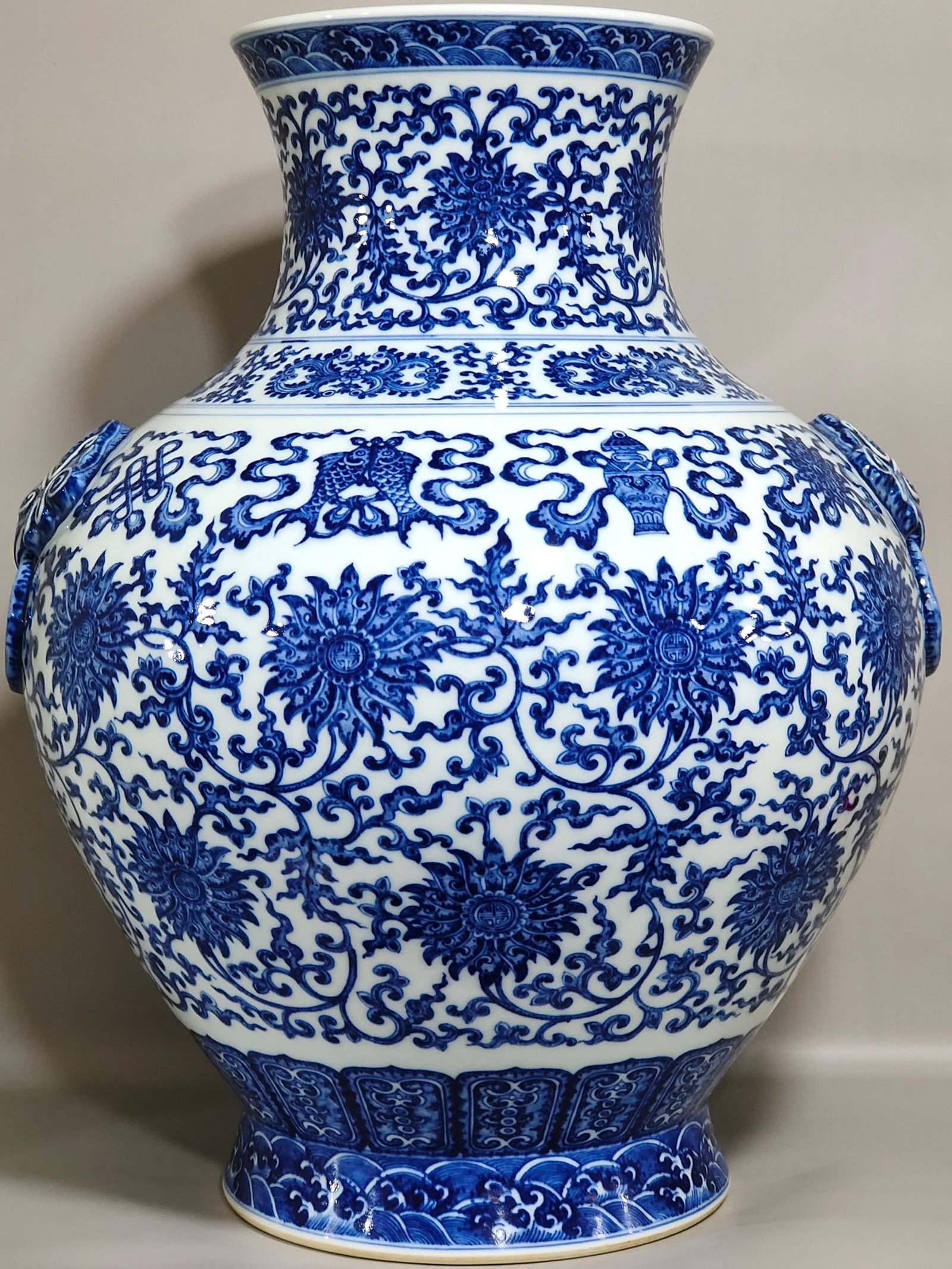 Qing Dynasty Qianlong blue and white intertwined branches with eight treasure vase