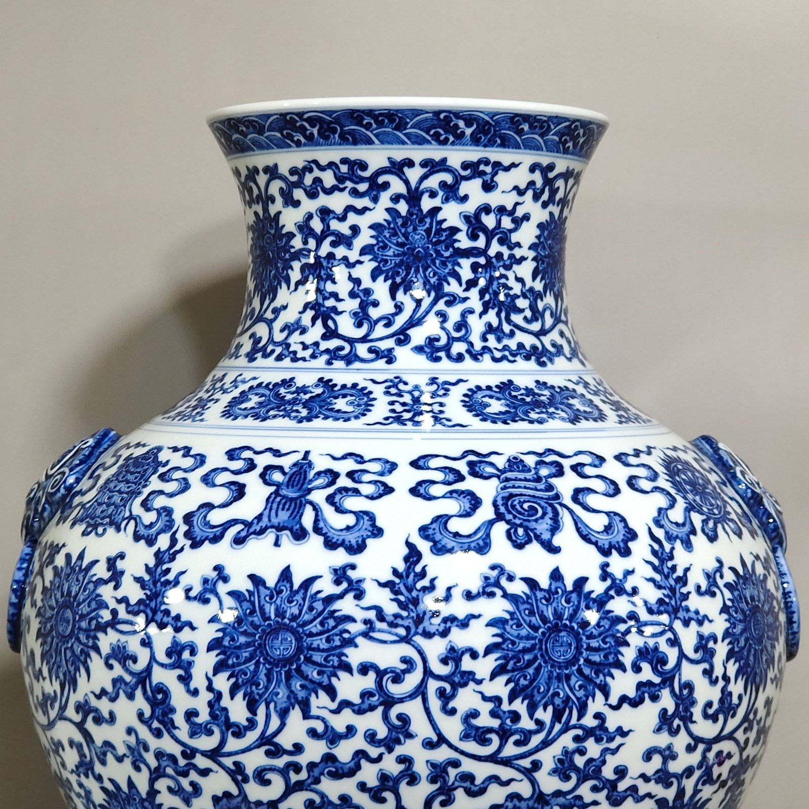 Qing Dynasty Qianlong blue and white intertwined branches with eight treasure vase