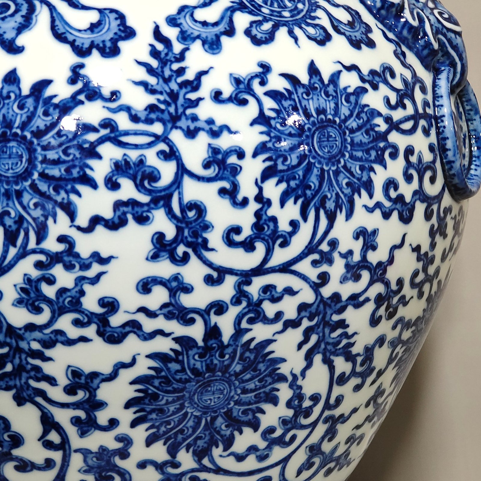 Qing Dynasty Qianlong blue and white intertwined branches with eight treasure vase