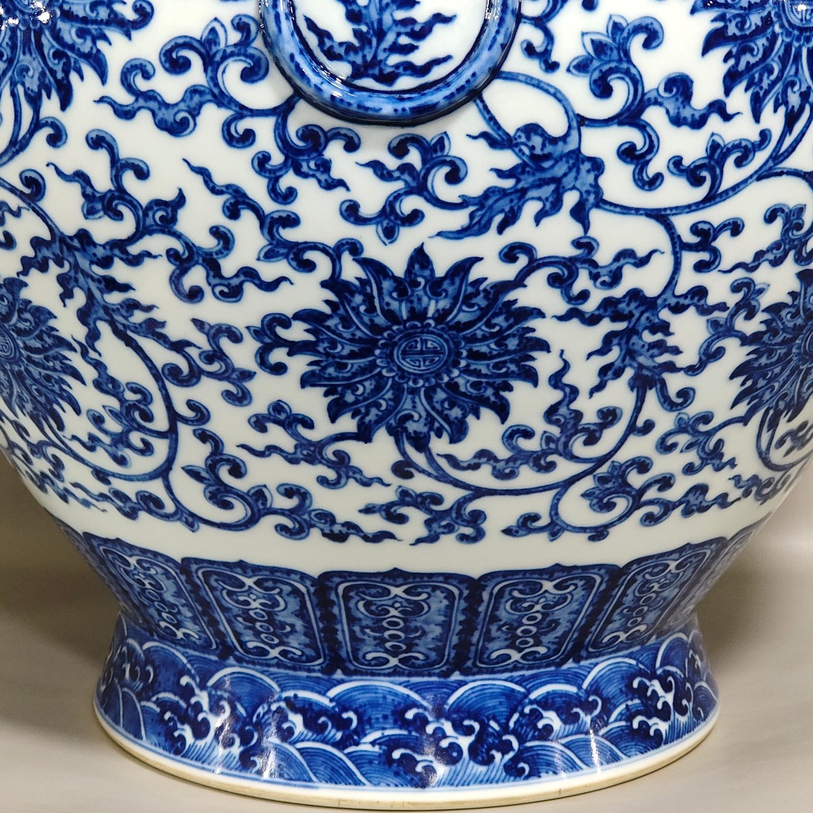 Qing Dynasty Qianlong blue and white intertwined branches with eight treasure vase
