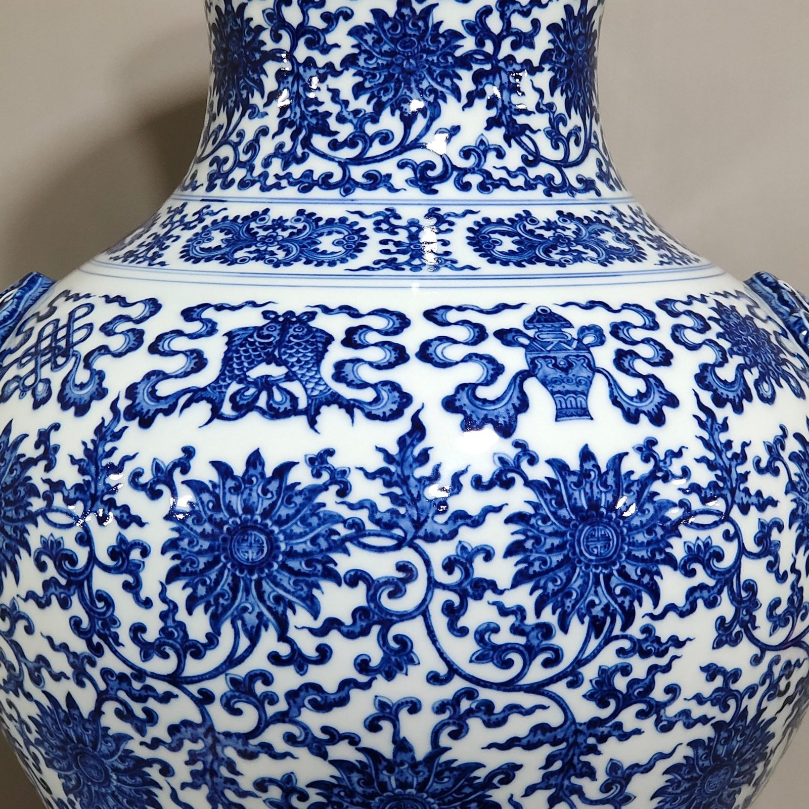 Qing Dynasty Qianlong blue and white intertwined branches with eight treasure vase