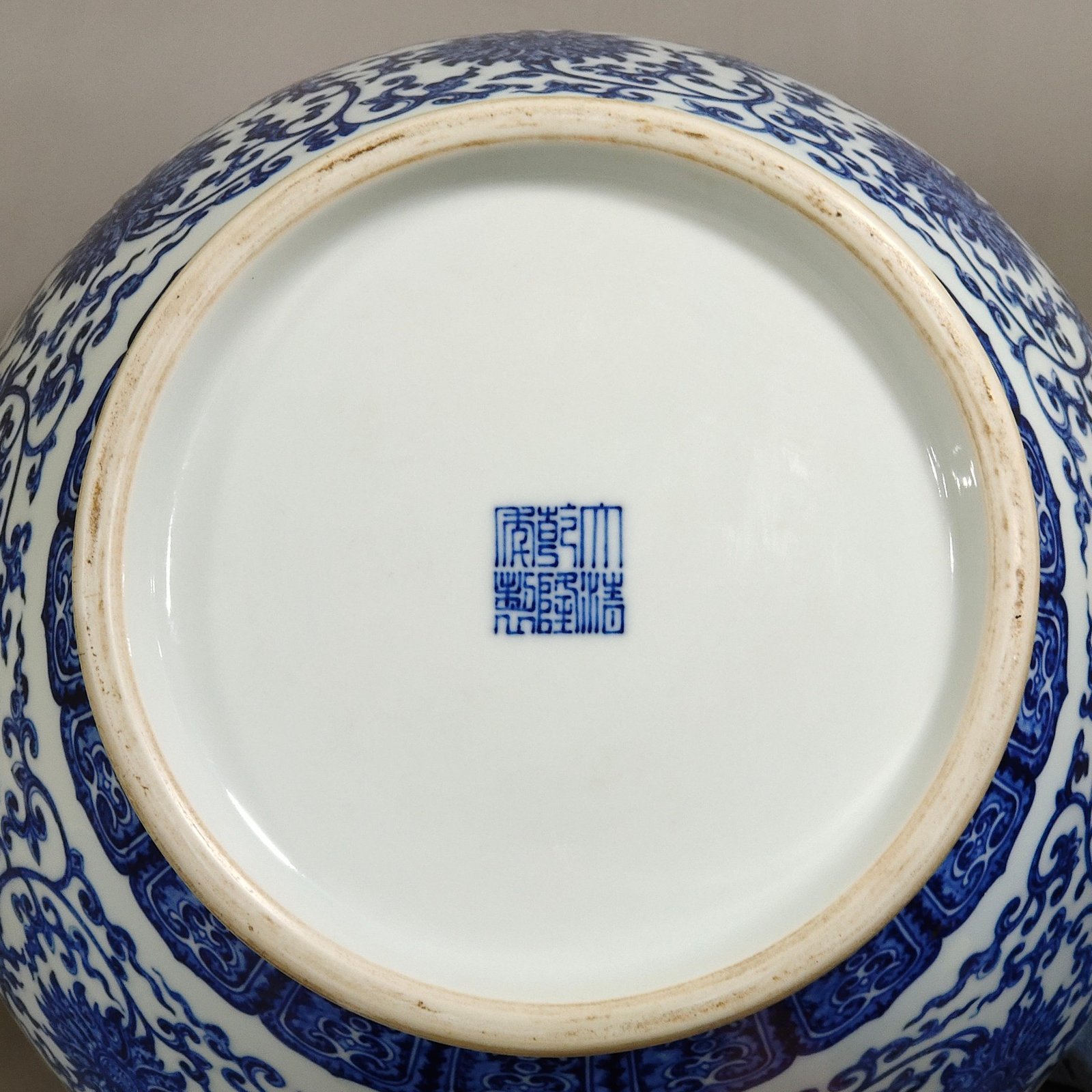 Qing Dynasty Qianlong blue and white intertwined branches with eight treasure vase