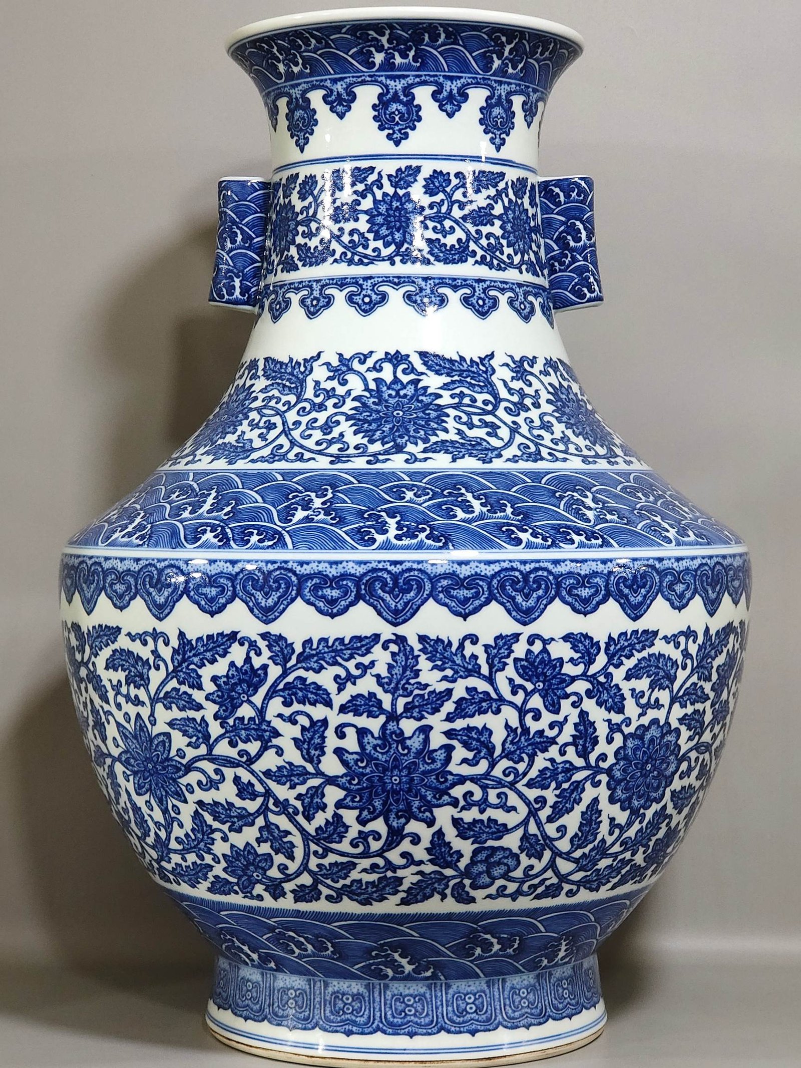 Qing Dynasty Qianlong blue and white tangled branches with two ears vase
