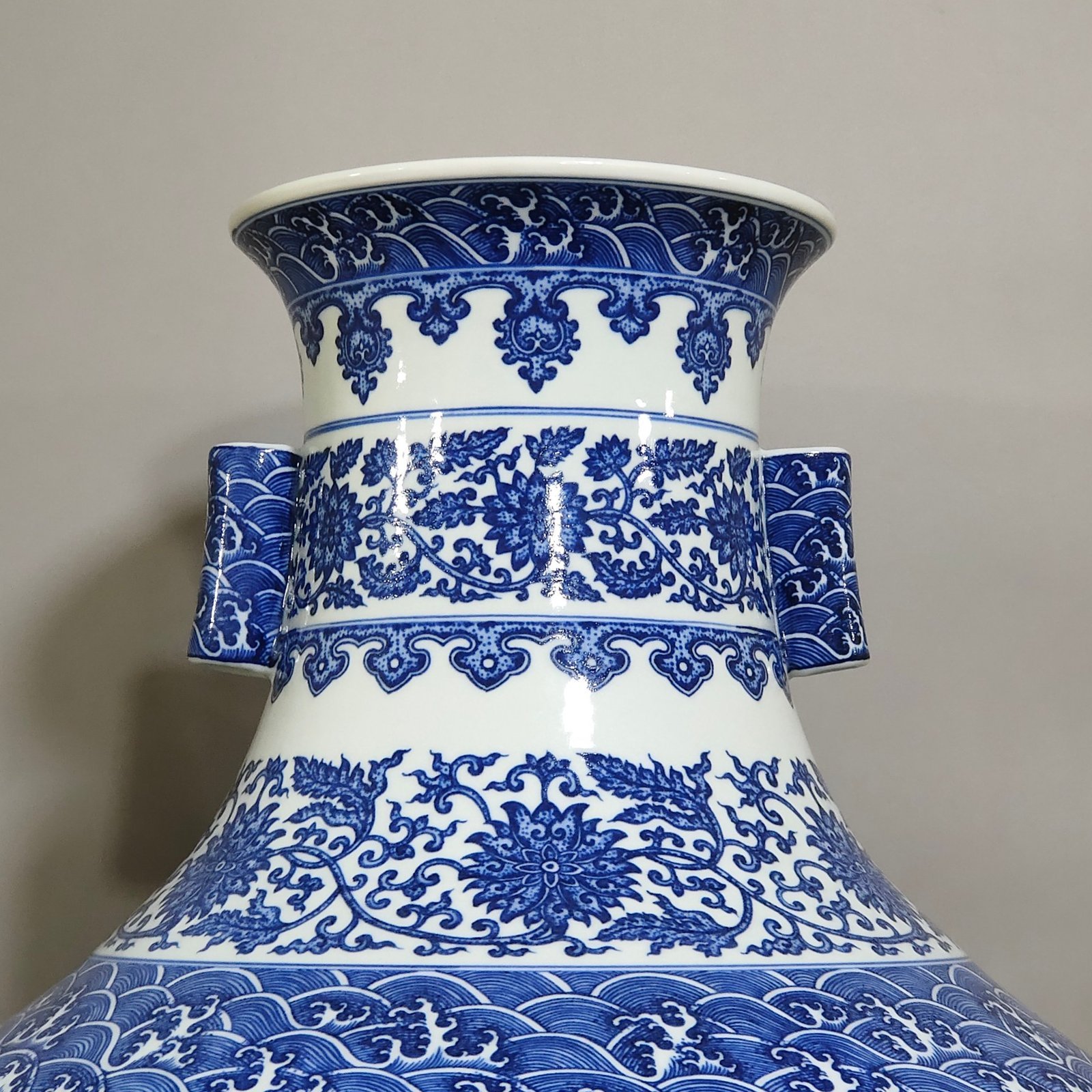 Qing Dynasty Qianlong blue and white tangled branches with two ears vase