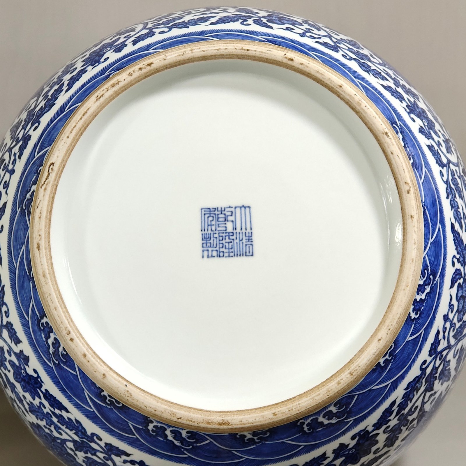 Qing Dynasty Qianlong blue and white tangled branches with two ears vase