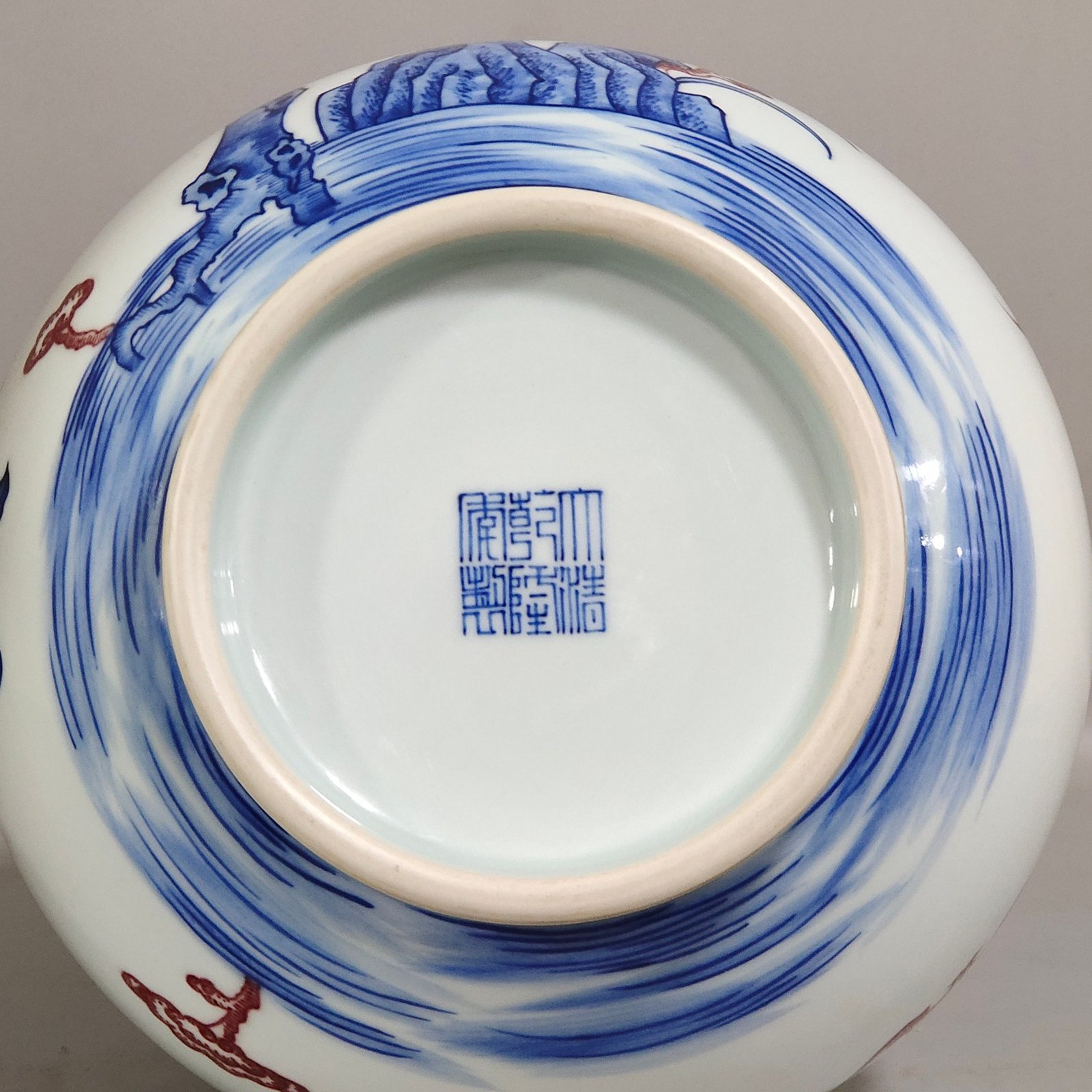 Qing Dynasty Qianlong blue and white underglaze red Nine Peach spring vase
