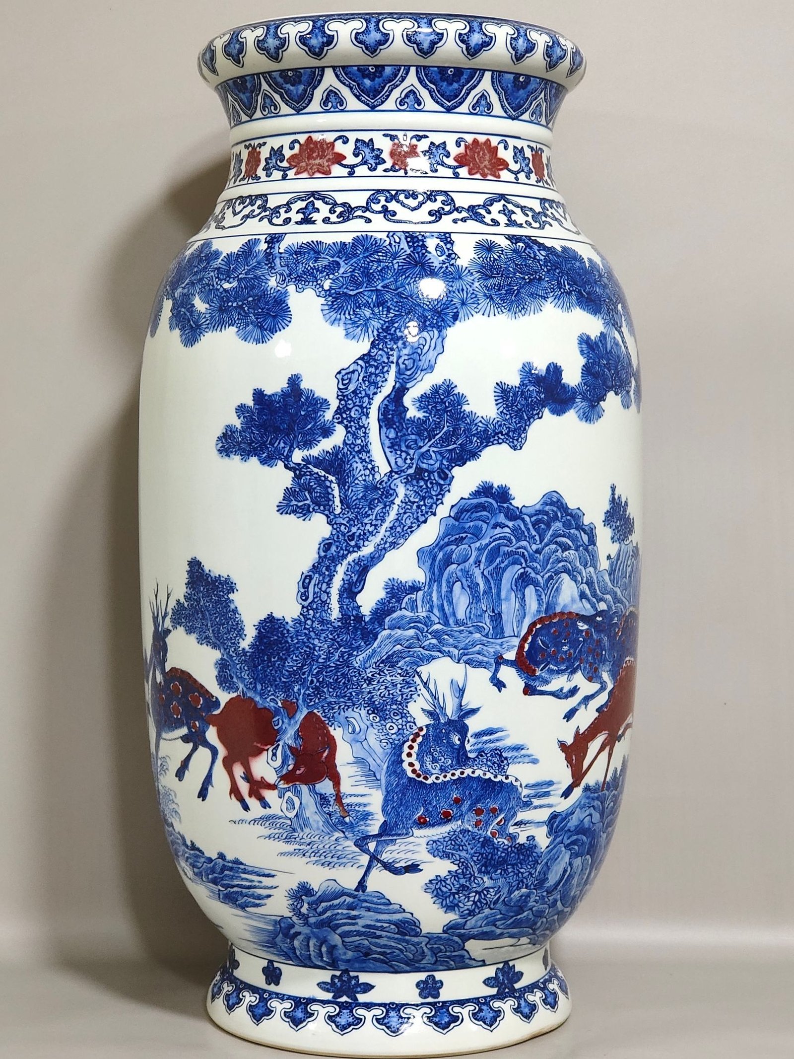 Qing Dynasty Qianlong blue and white underglaze vase with red pine and deer pictures