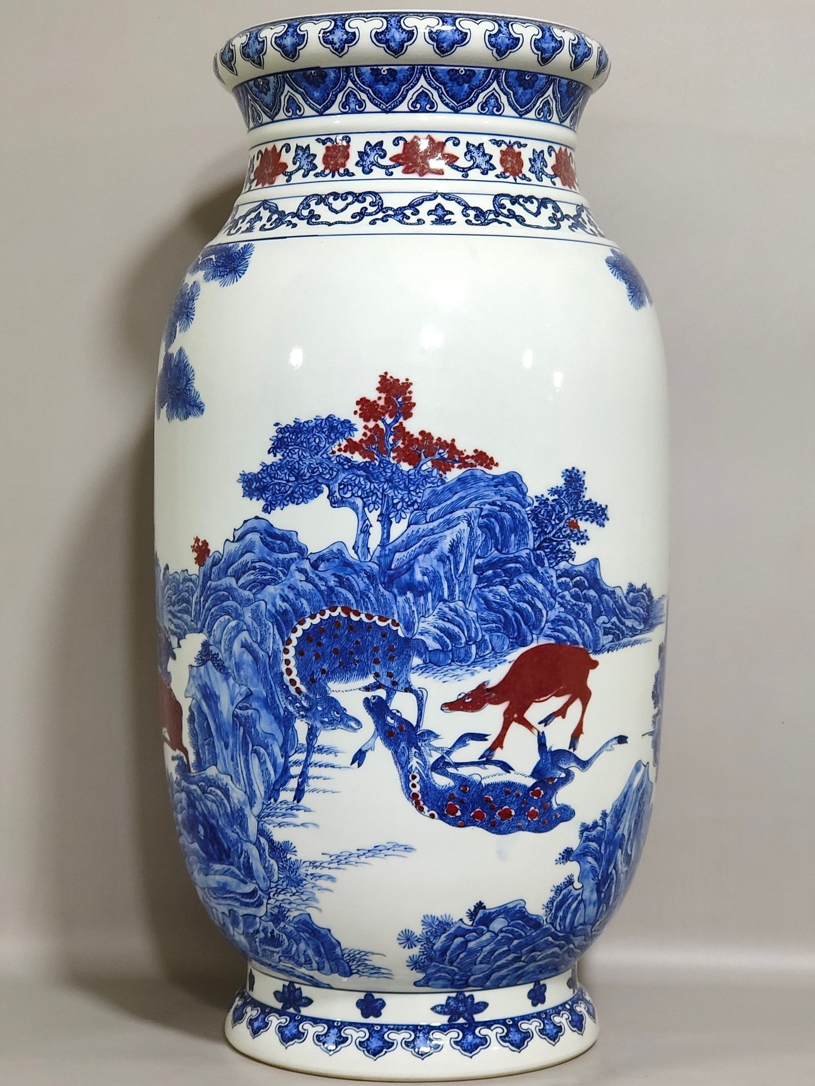 Qing Dynasty Qianlong blue and white underglaze vase with red pine and deer pictures