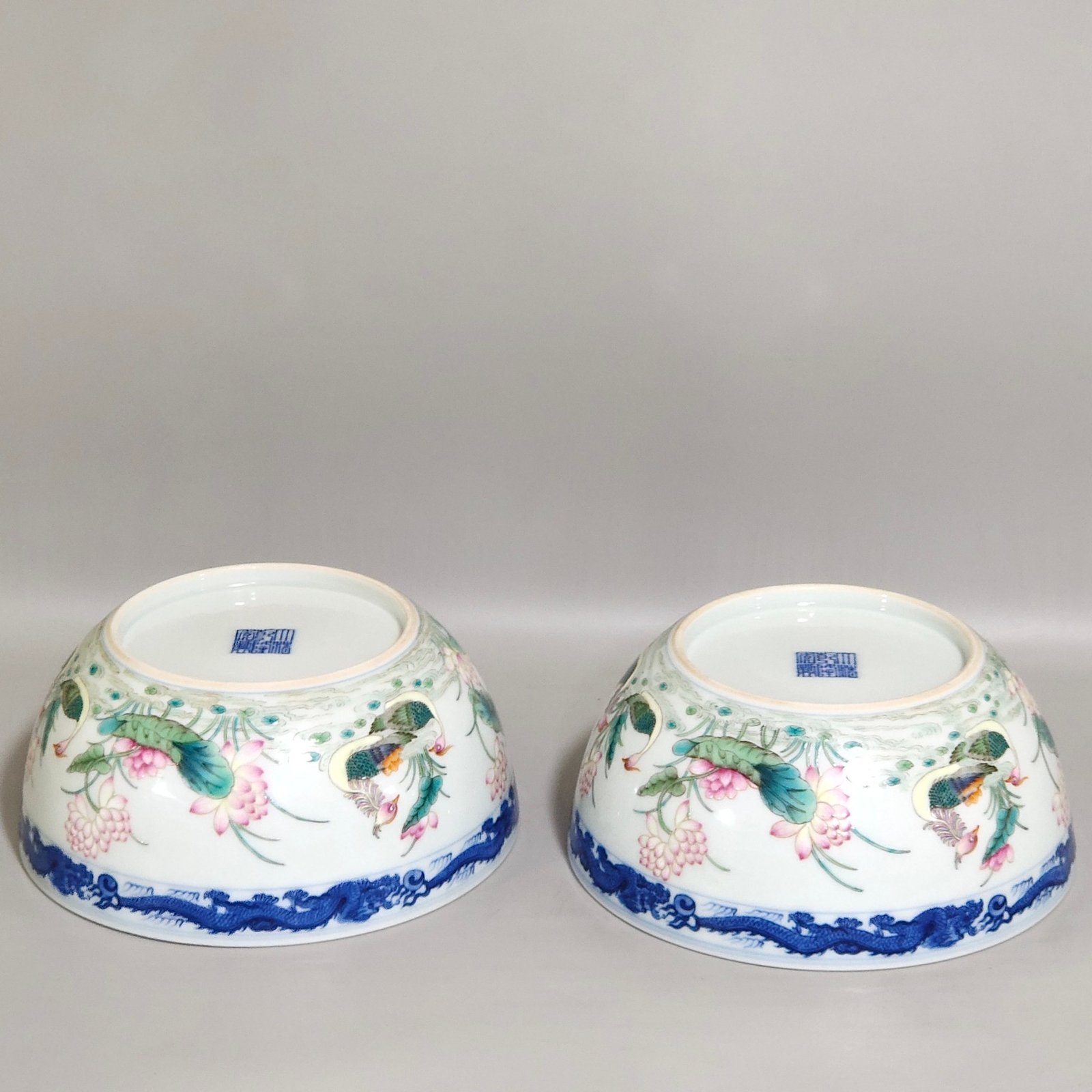 Qing Dynasty Qianlong blue and white dragon-patterned lotus bowl with mandarin ducks