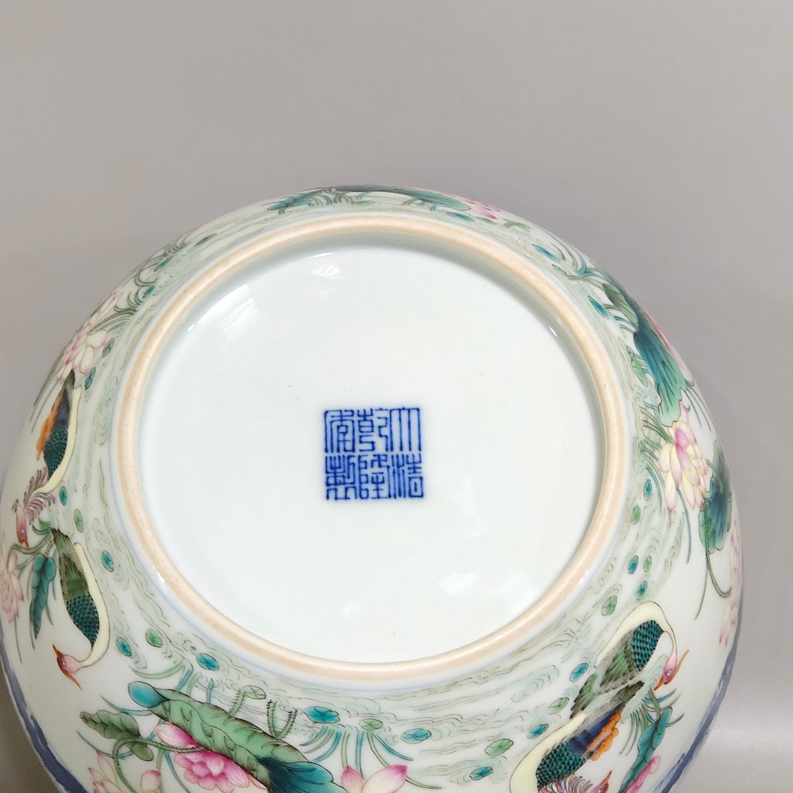 Qing Dynasty Qianlong blue and white dragon-patterned lotus bowl with mandarin ducks