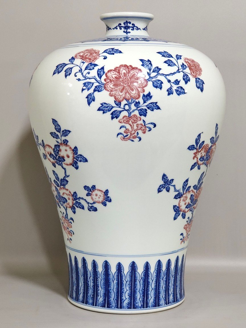 Qing Dynasty Qianlong celadon-glazed red three-plum vase