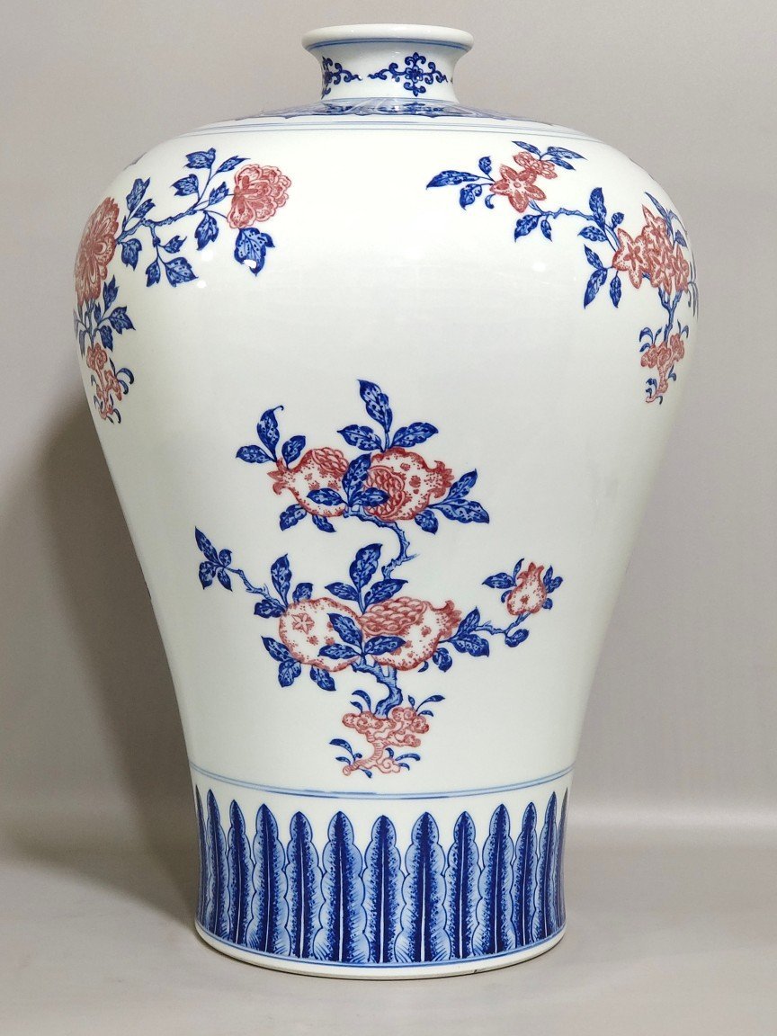 Qing Dynasty Qianlong celadon-glazed red three-plum vase