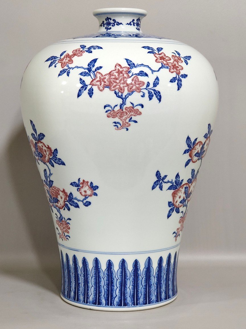 Qing Dynasty Qianlong celadon-glazed red three-plum vase