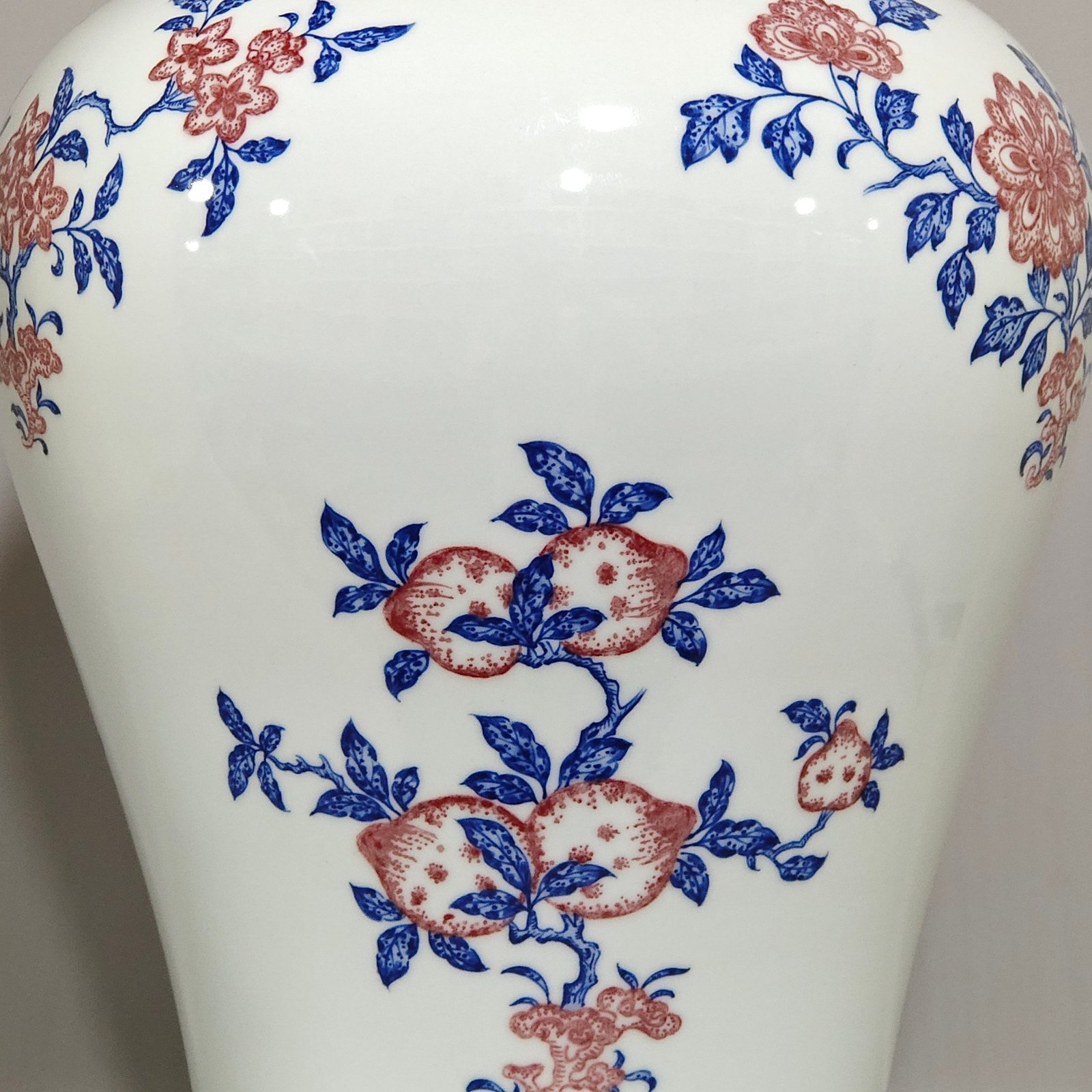 Qing Dynasty Qianlong celadon-glazed red three-plum vase