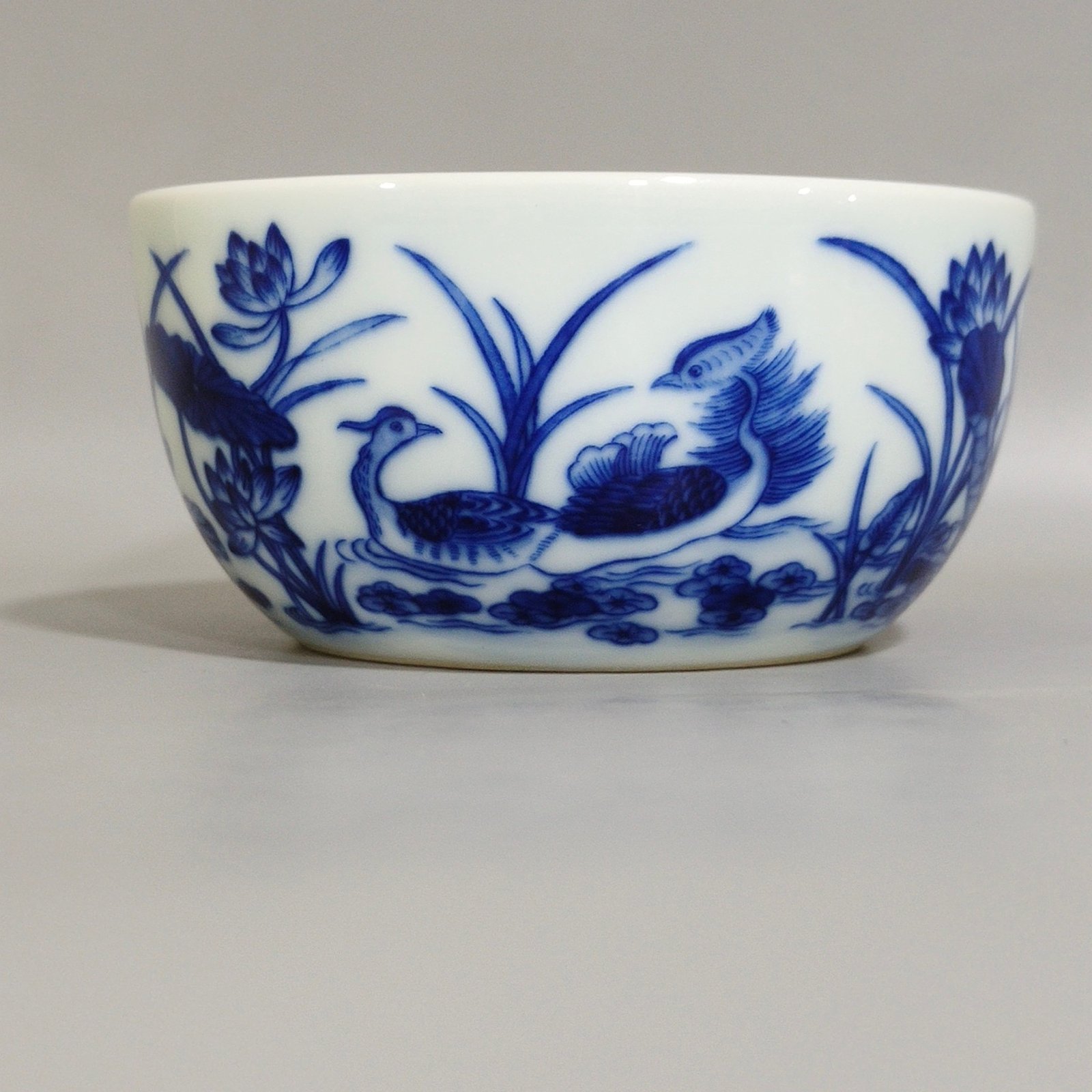 Qing Dynasty Qianlong A lotus cup with mandarin ducks playing in the water