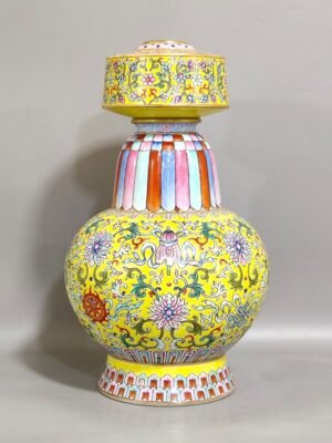Qing Dynasty Qianlong Yellow Ground Eight-Bao Lotus Top Penba Vase