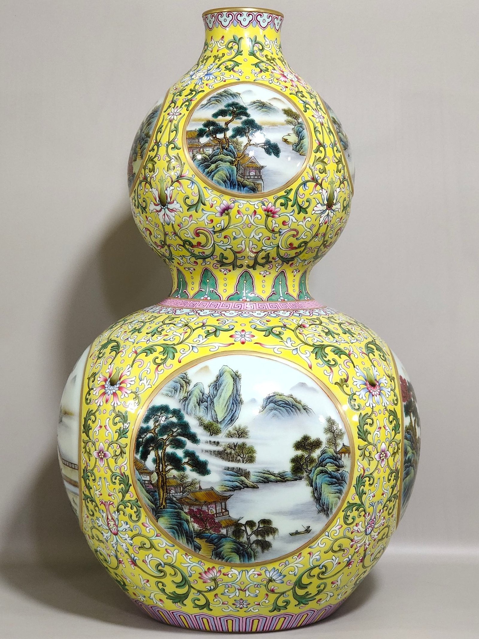 Qing Dynasty Qianlong yellow ground window landscape attic gourd vase