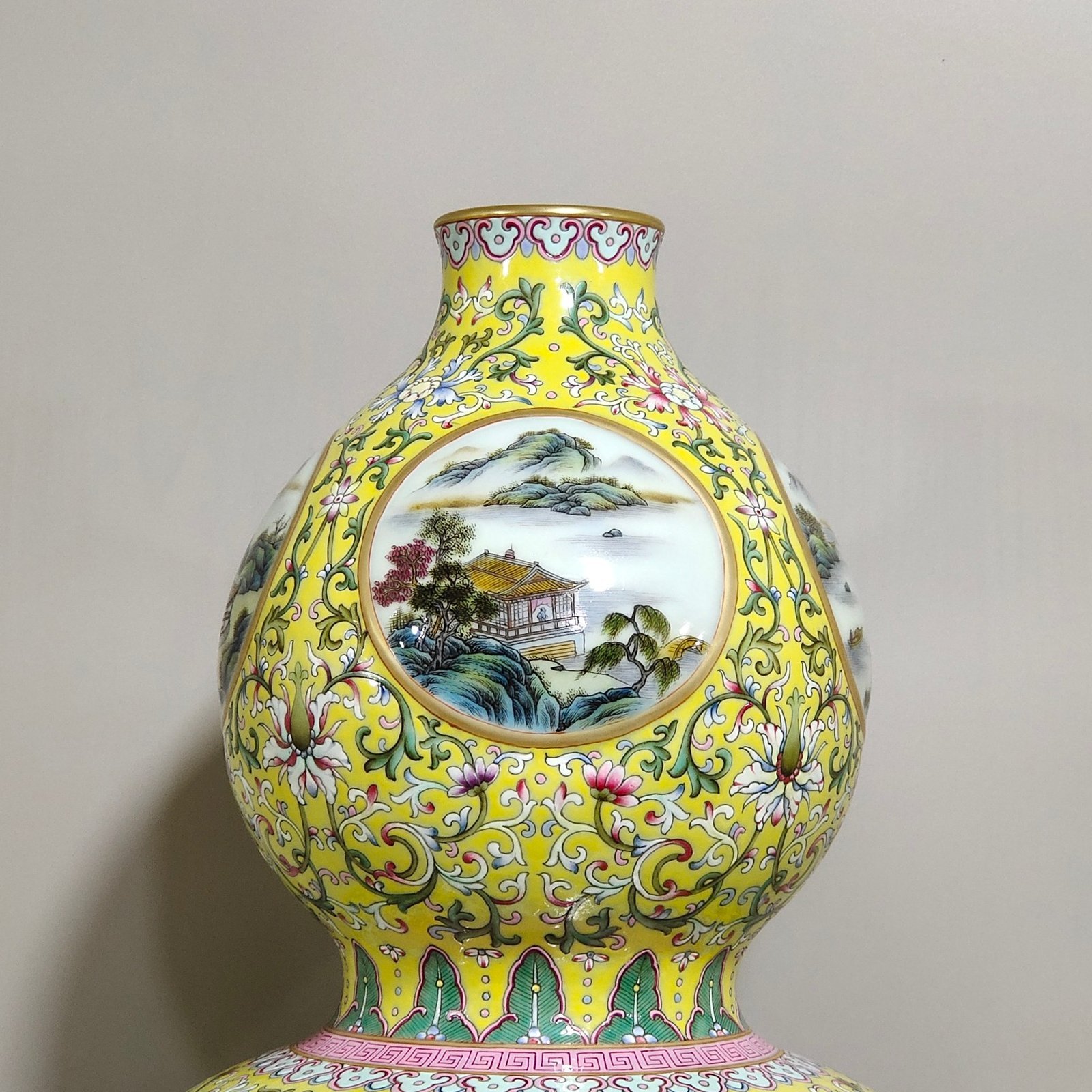 Qing Dynasty Qianlong yellow ground window landscape attic gourd vase