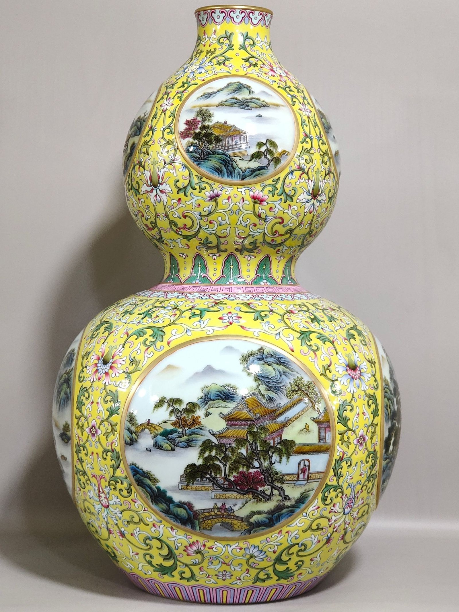Qing Dynasty Qianlong yellow ground window landscape attic gourd vase
