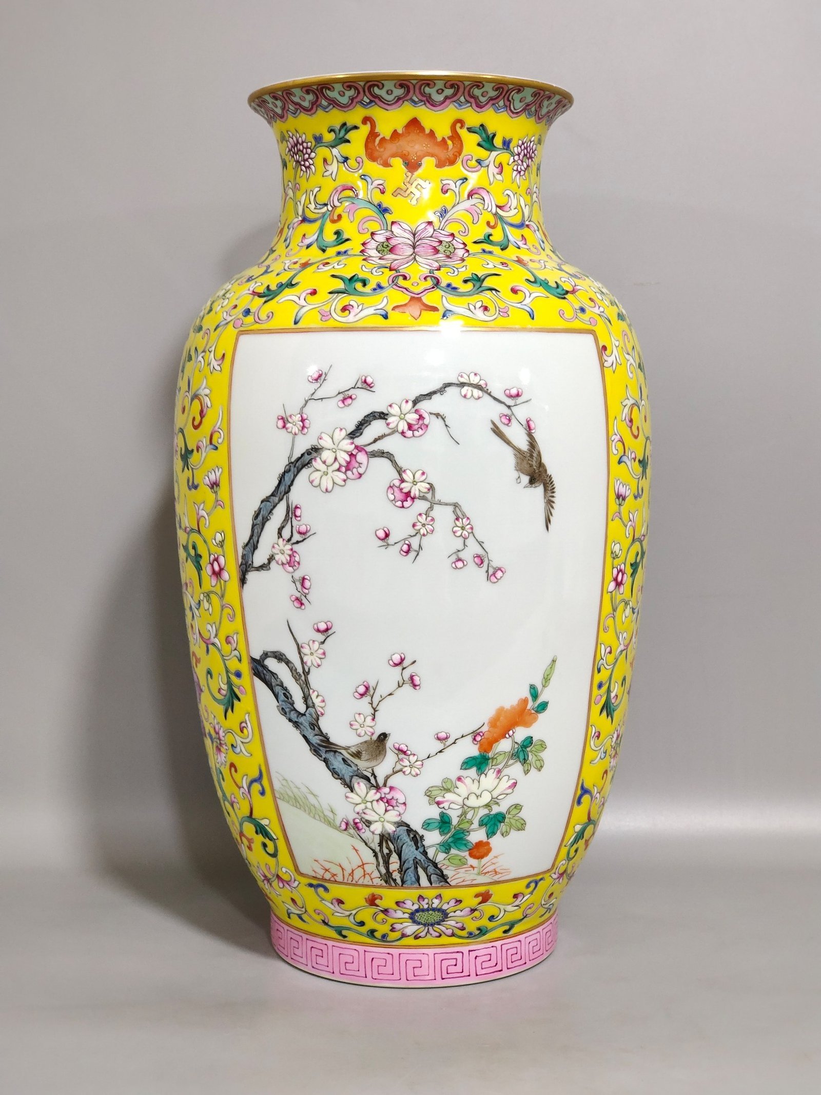 Qing Dynasty Qianlong yellow ground flower and bird vase