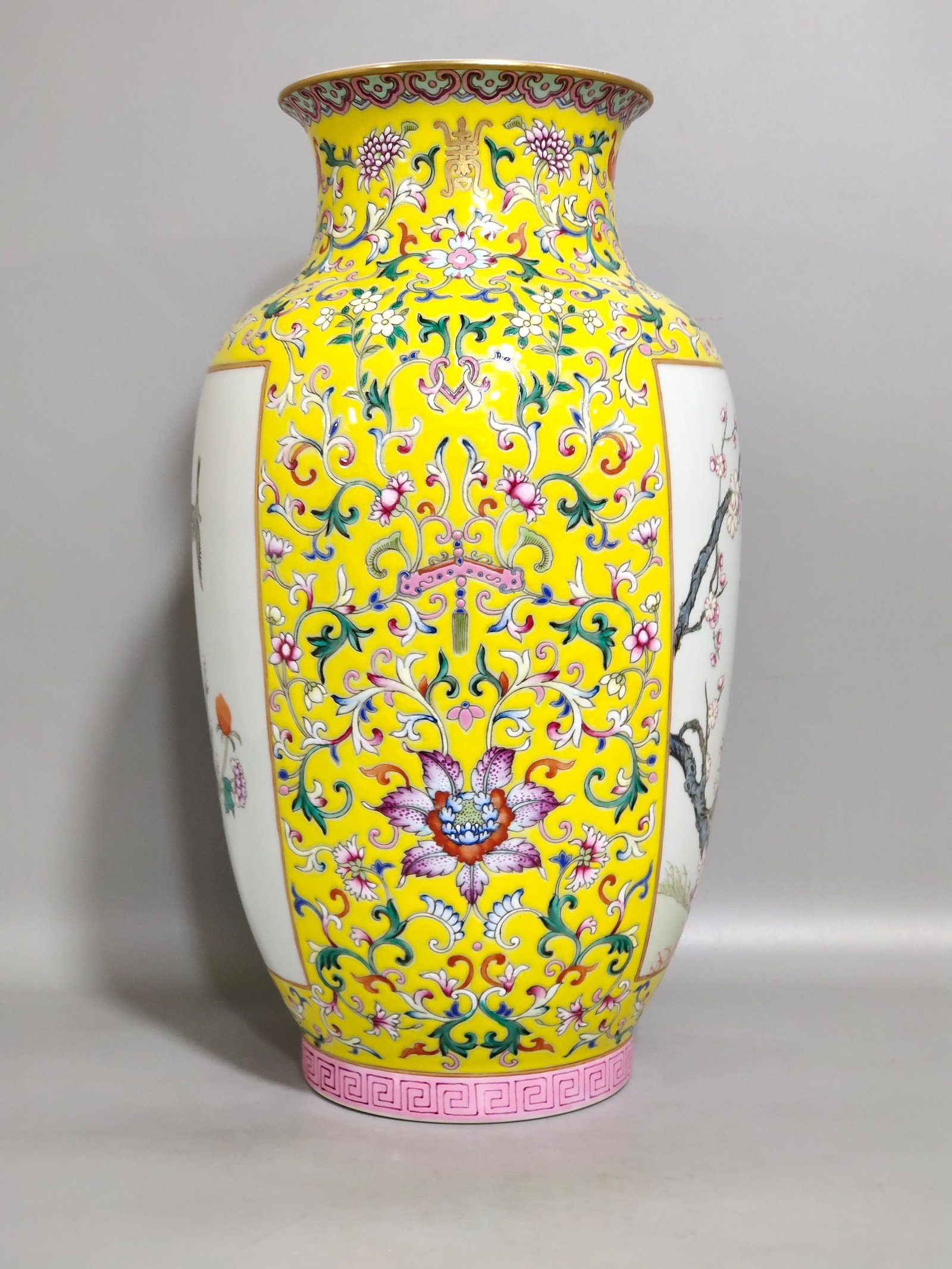 Qing Dynasty Qianlong yellow ground flower and bird vase
