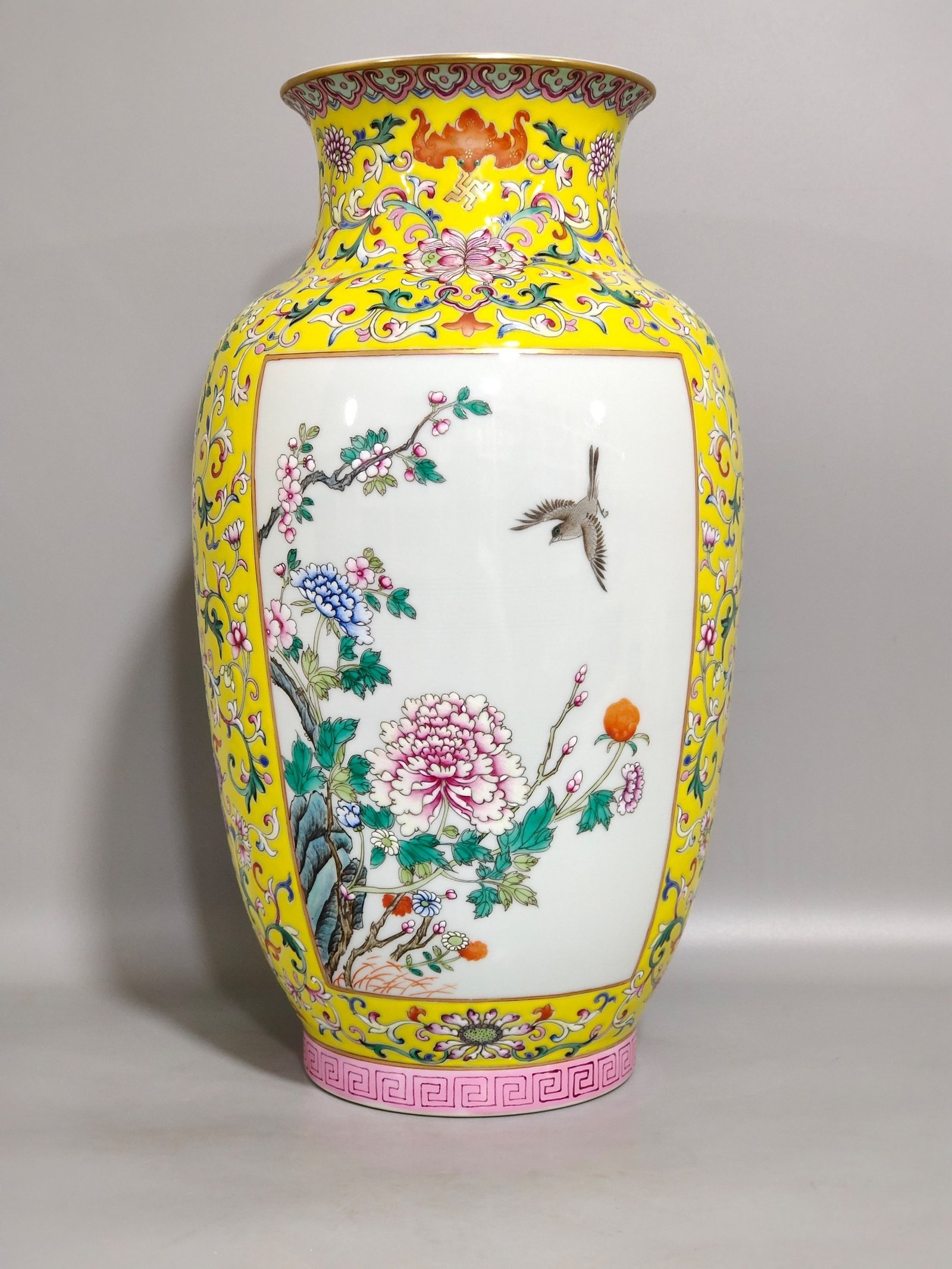 Qing Dynasty Qianlong yellow ground flower and bird vase