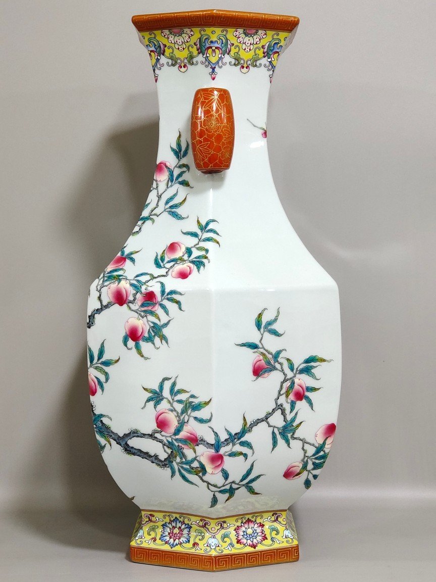Qing Dynasty Qianlong yellow ground border plum peach congratulations six-sided amphora