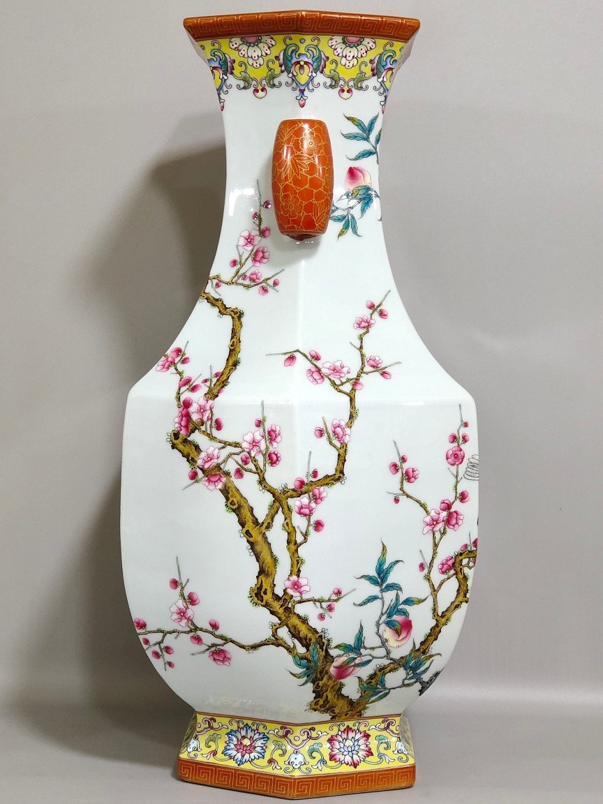 Qing Dynasty Qianlong yellow ground border plum peach congratulations six-sided amphora