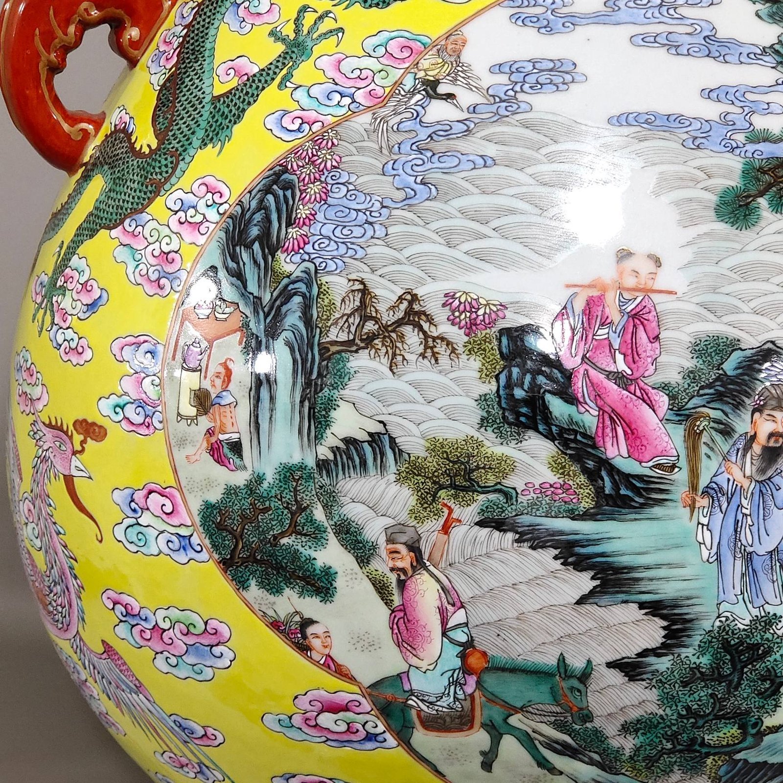 Qing Dynasty Qianlong yellow-glazed vase with five dragons and five phoenixes and eight immortals