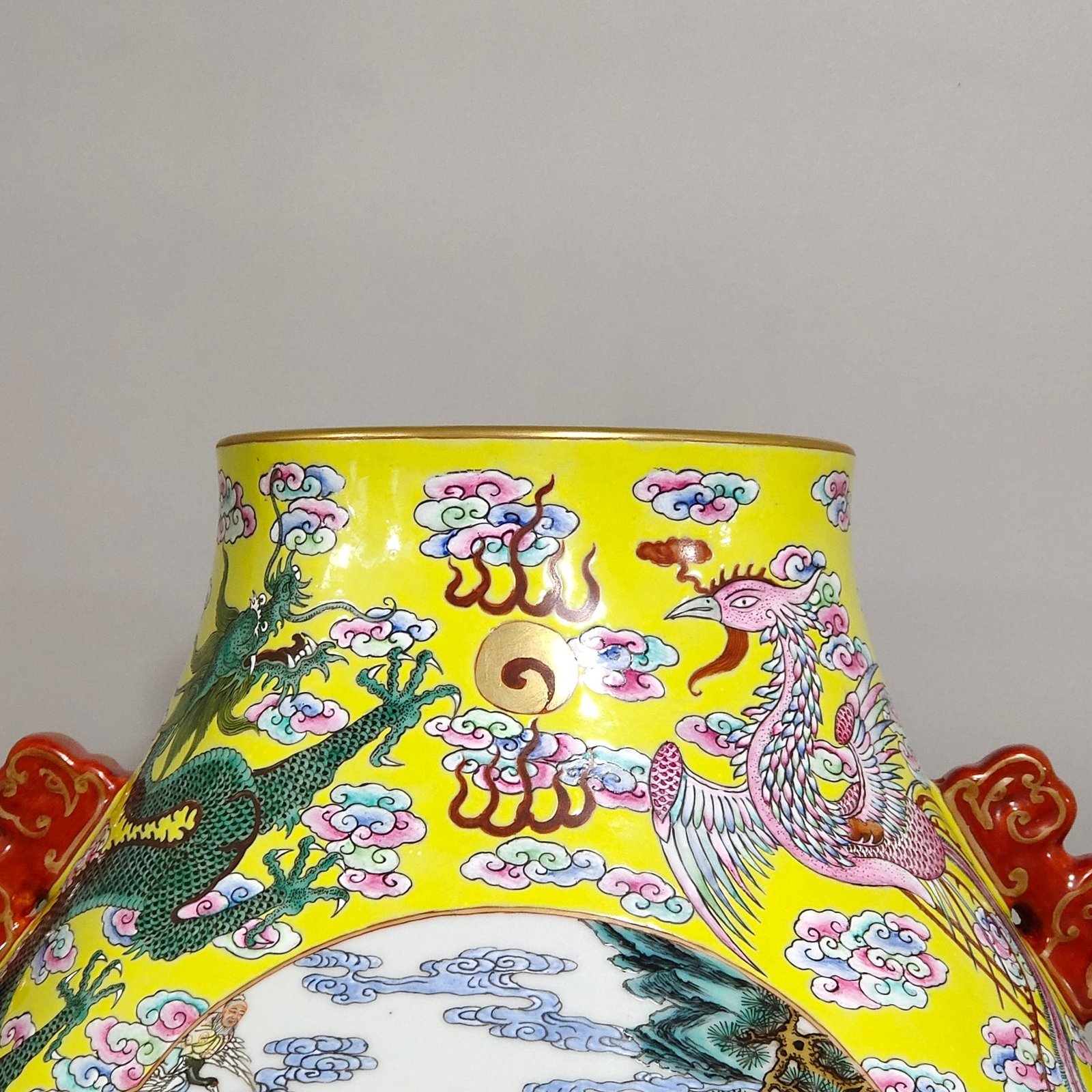 Qing Dynasty Qianlong yellow-glazed vase with five dragons and five phoenixes and eight immortals