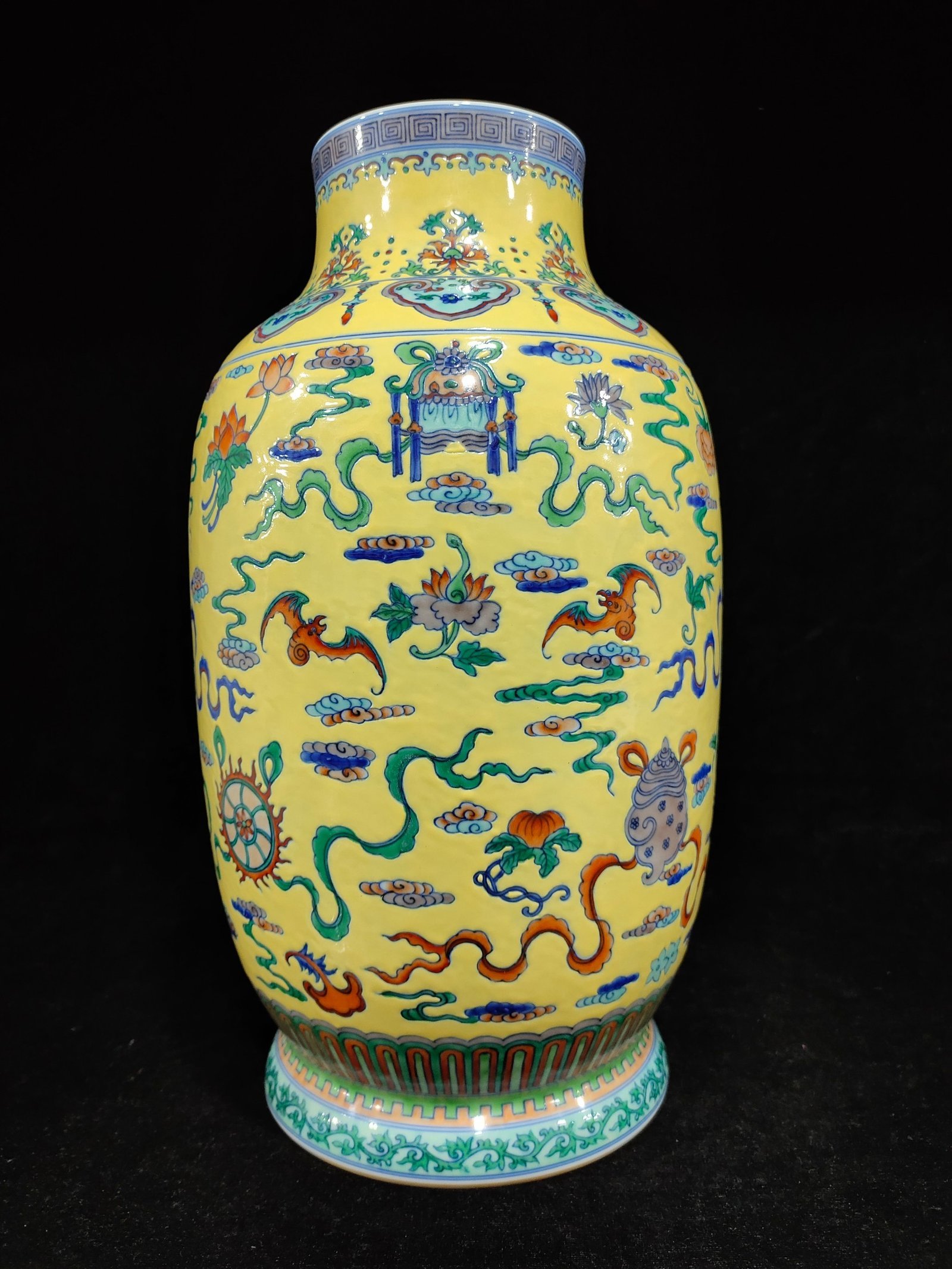 Qing Dynasty Qianlong Yellow Glaze Eight Treasures Winter Melon vase
