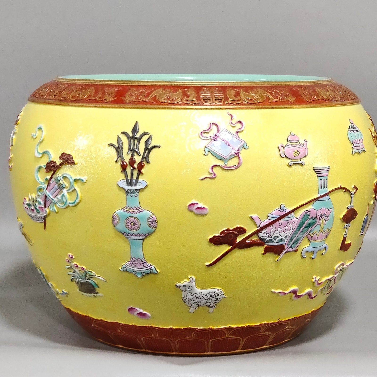 Qing Dynasty Qianlong yellow glaze embossed eight-treasure pattern pen seal