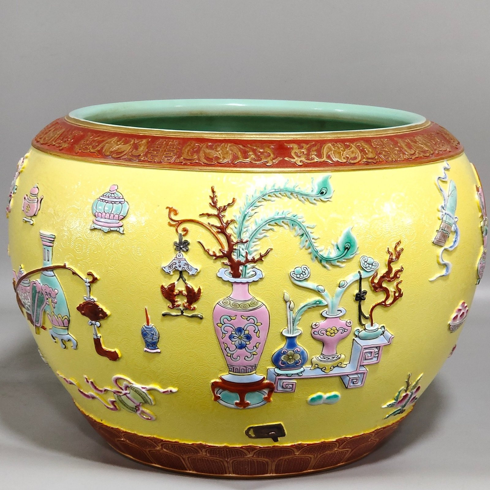 Qing Dynasty Qianlong yellow glaze embossed eight-treasure pattern pen seal