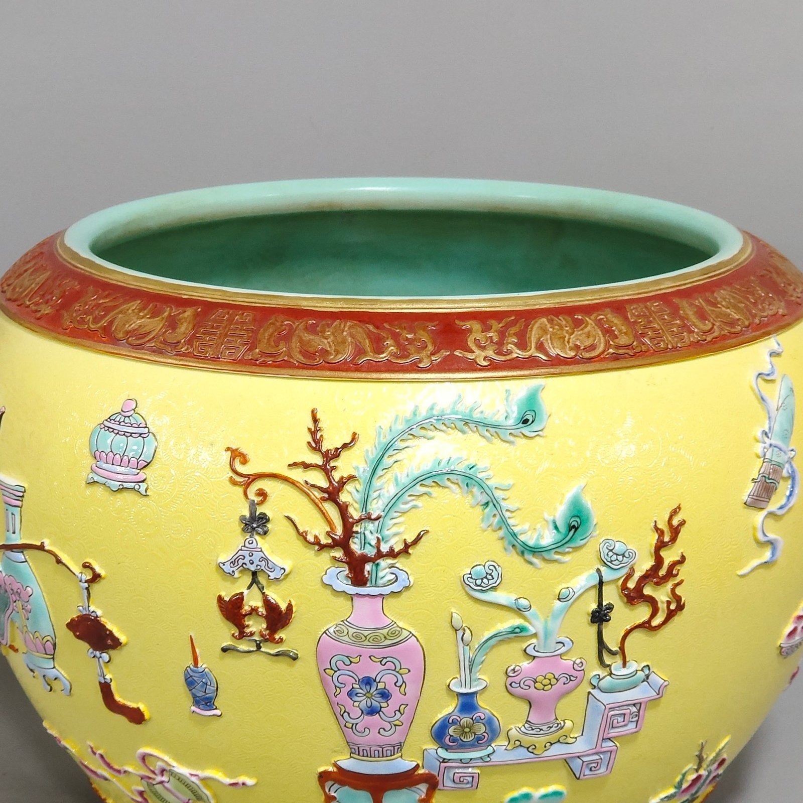 Qing Dynasty Qianlong yellow glaze embossed eight-treasure pattern pen seal