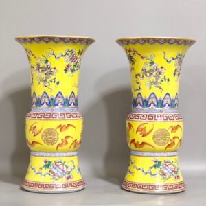 Qing Dynasty Qianlong yellow glaze phoenix tail statue with eight treasures pattern