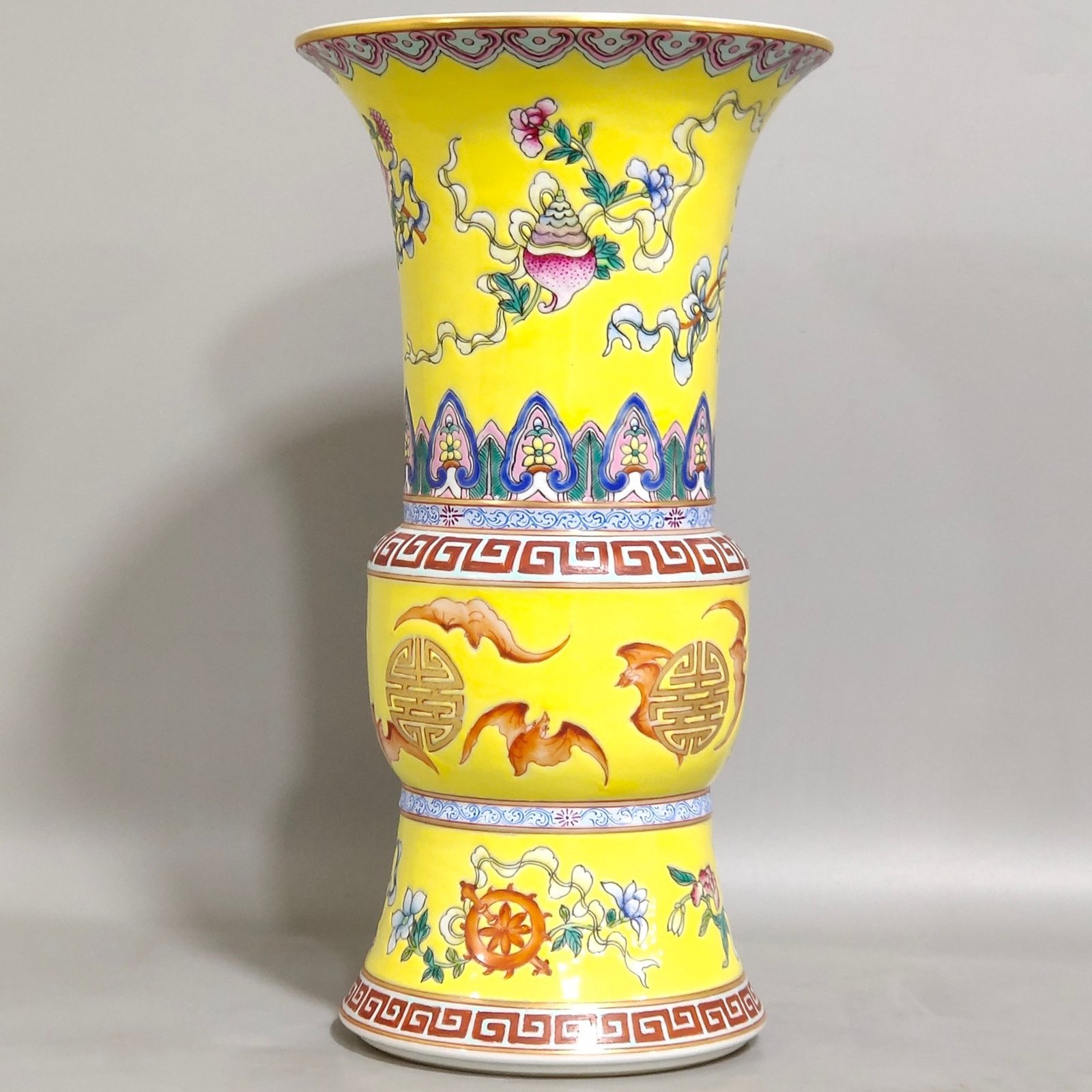 Qing Dynasty Qianlong yellow glaze phoenix tail statue with eight treasures pattern
