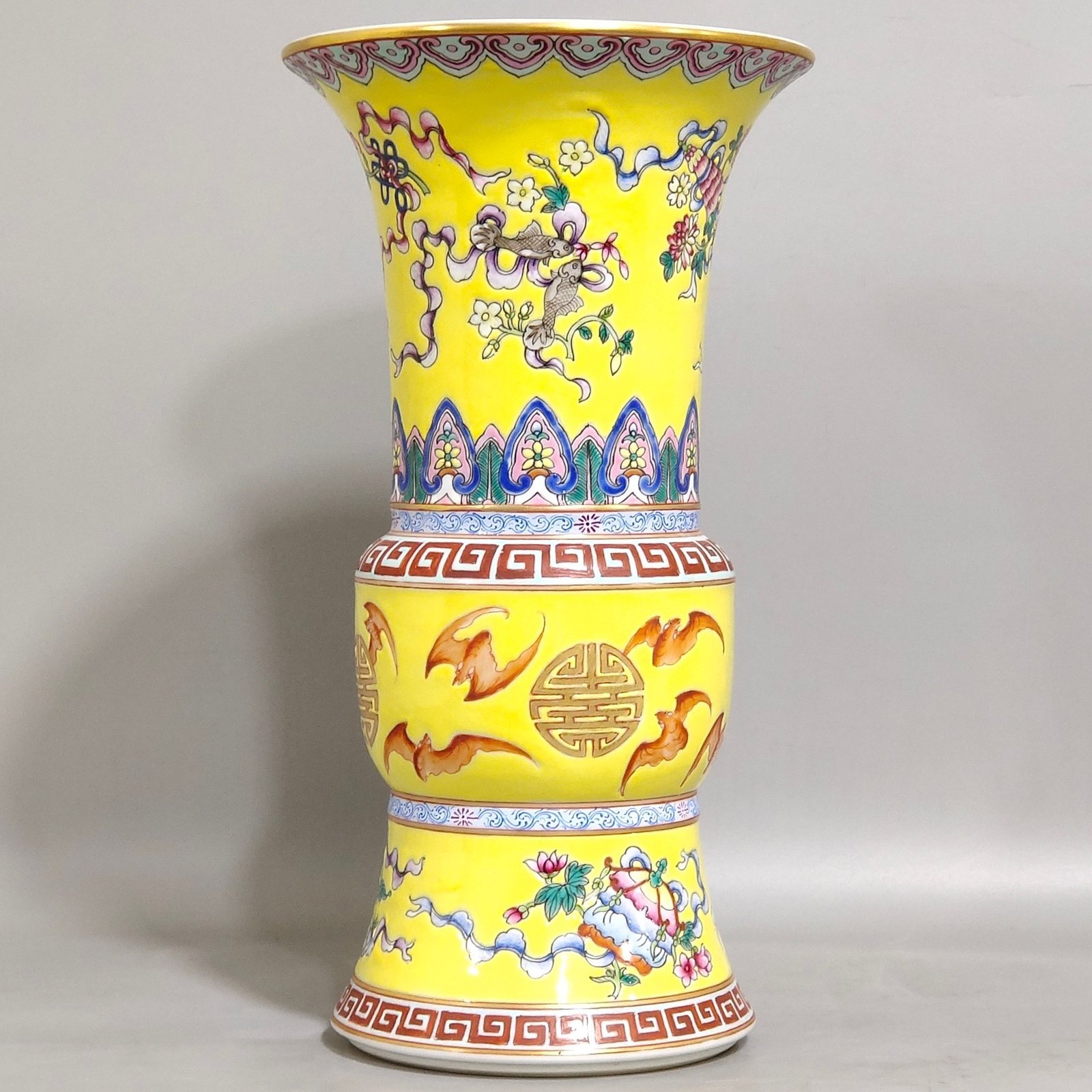 Qing Dynasty Qianlong yellow glaze phoenix tail statue with eight treasures pattern