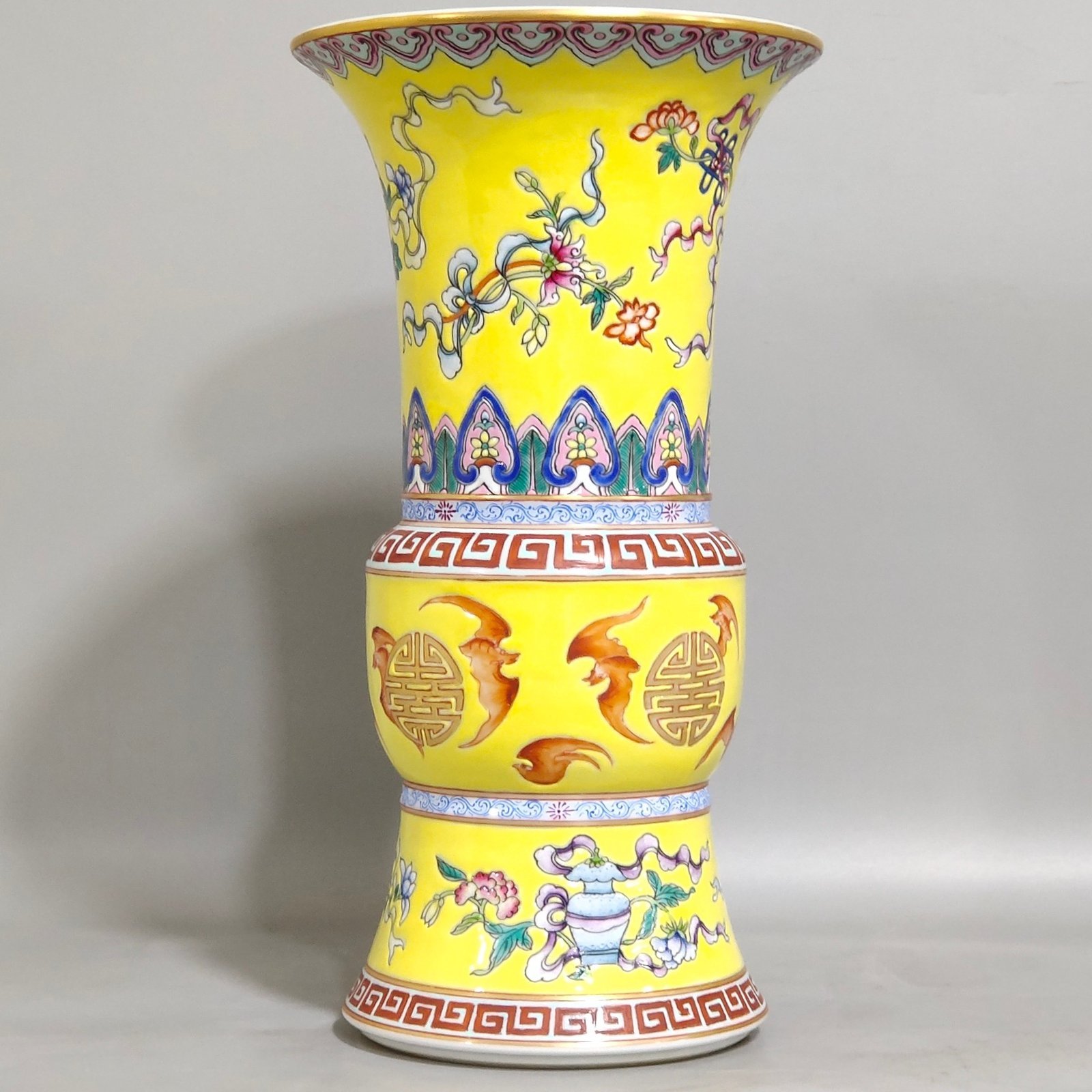 Qing Dynasty Qianlong yellow glaze phoenix tail statue with eight treasures pattern