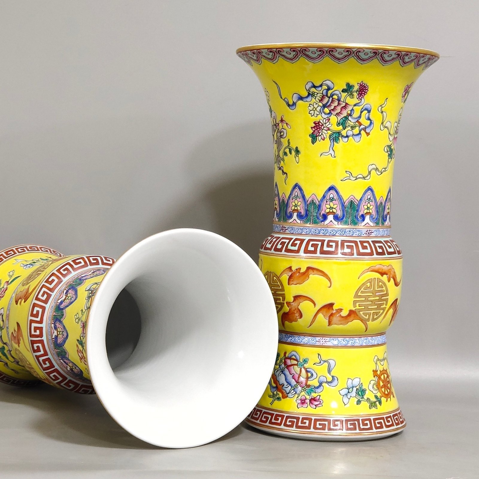 Qing Dynasty Qianlong yellow glaze phoenix tail statue with eight treasures pattern