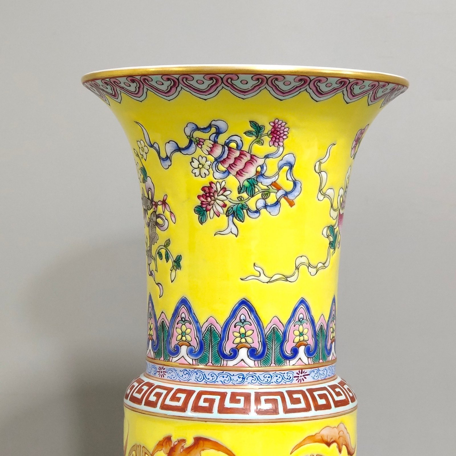 Qing Dynasty Qianlong yellow glaze phoenix tail statue with eight treasures pattern