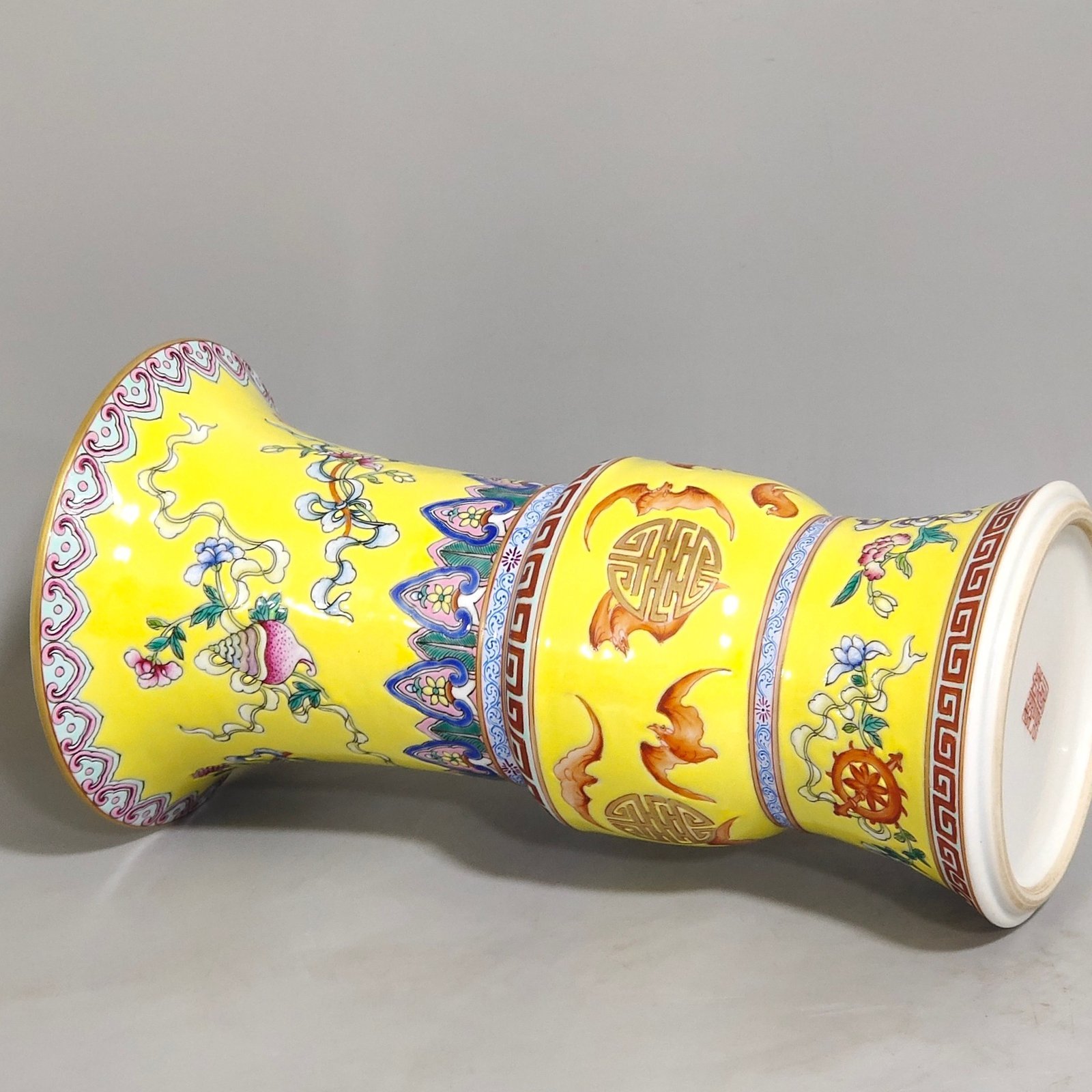 Qing Dynasty Qianlong yellow glaze phoenix tail statue with eight treasures pattern