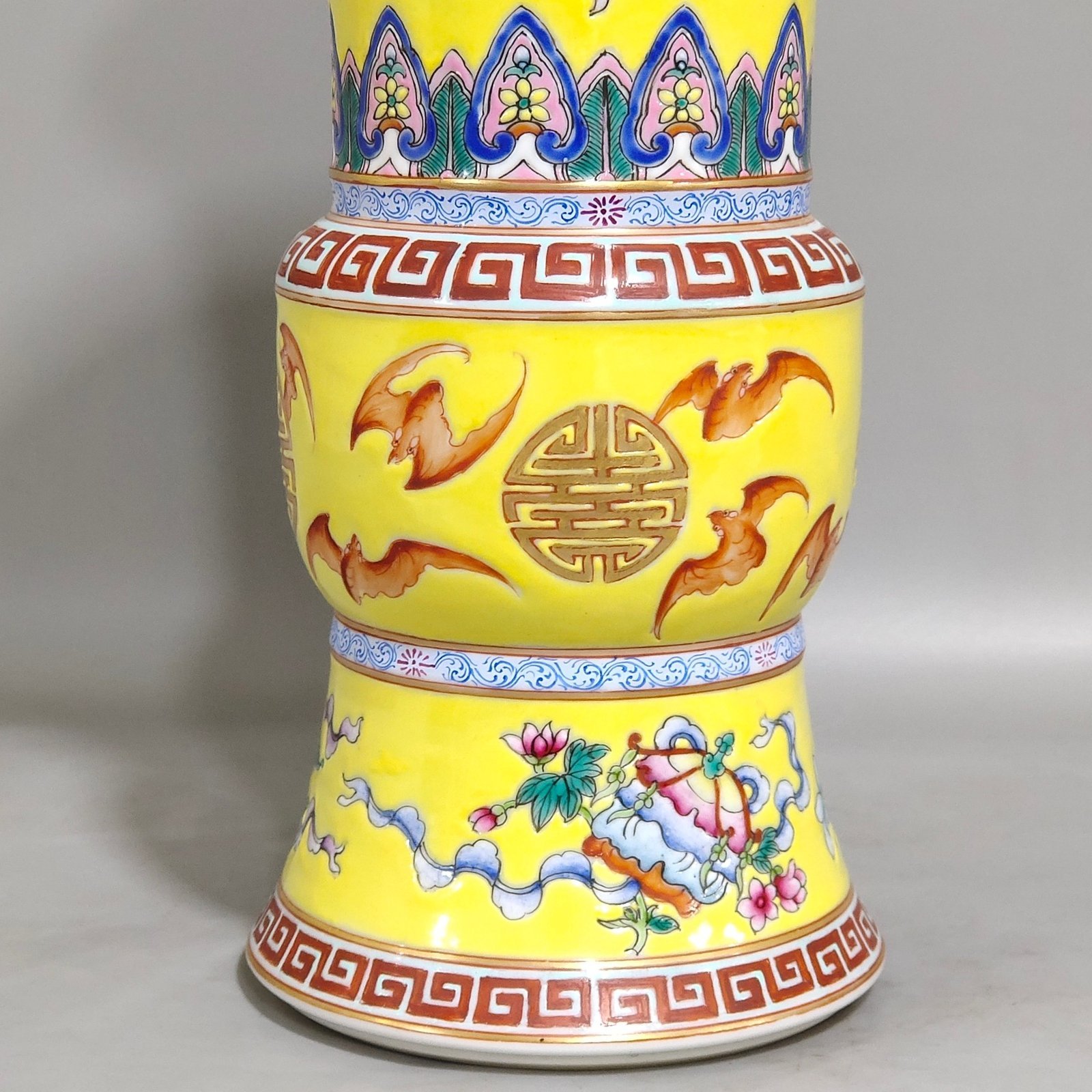 Qing Dynasty Qianlong yellow glaze phoenix tail statue with eight treasures pattern