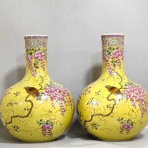 Qing Dynasty Qianlong yellow glaze flower and bird celestial vase